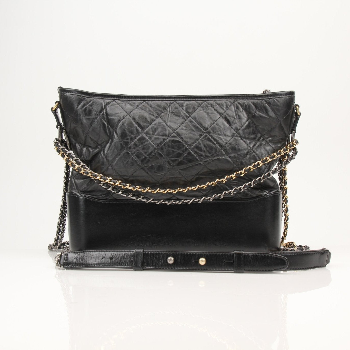 Chanel Gabrielle black hobo handbag with gold hardware, soft leather and spacious design, stylish for everyday use.