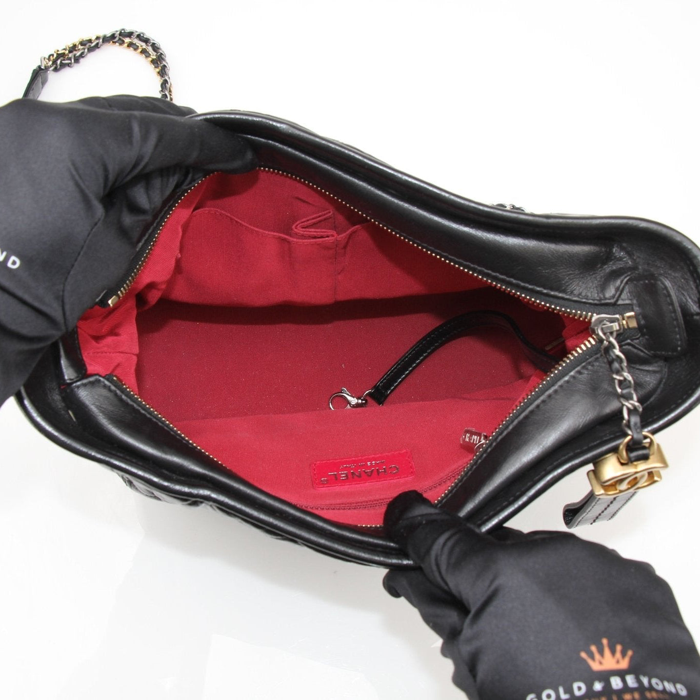 Chanel Gabrielle black hobo handbag by Gold & Beyond, showcasing a stylish, spacious leather shoulder bag with gold-tone hardware.