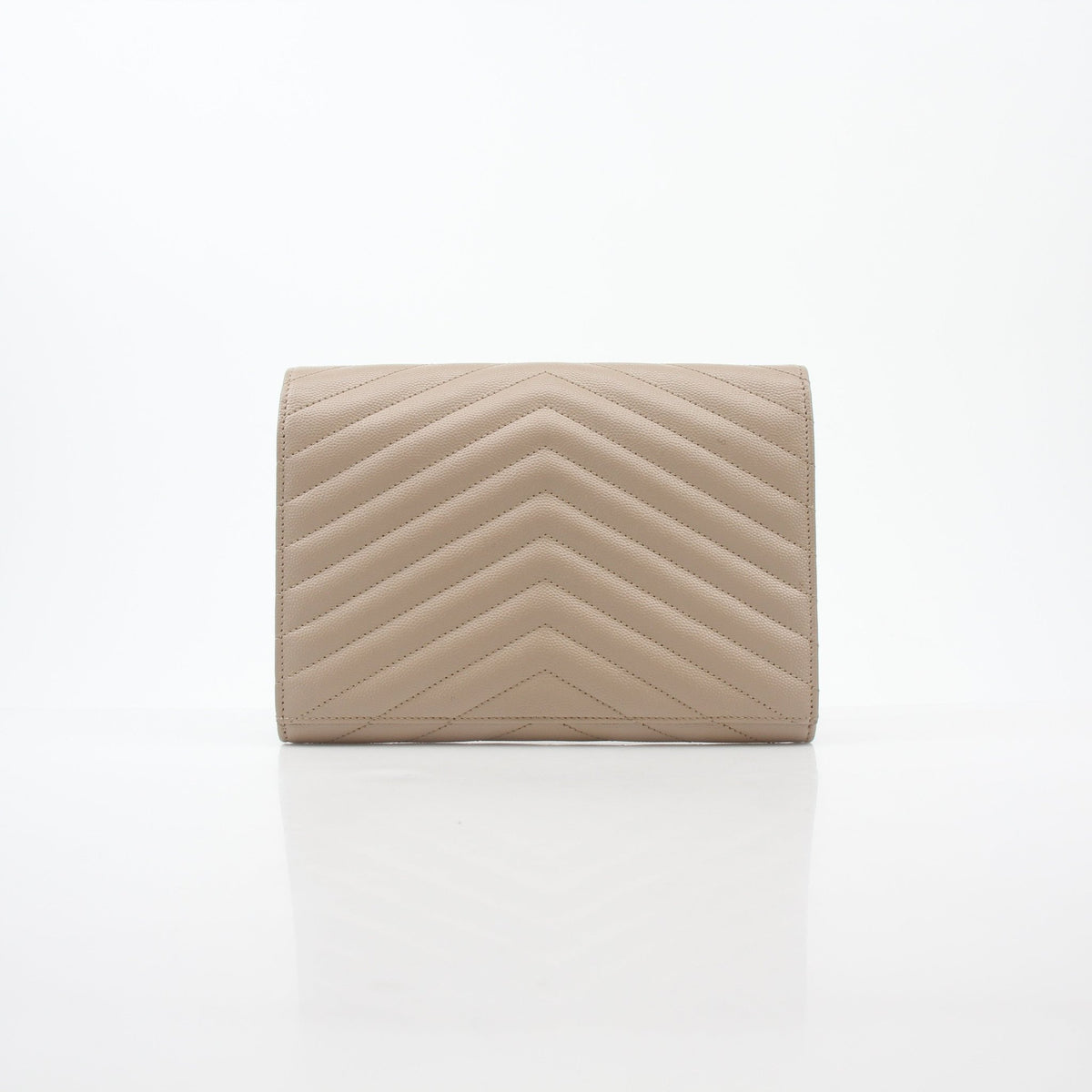 Saint Laurent dark beige Cassandre matelassé envelope clutch handbag with gold hardware and flap closure, textured design.