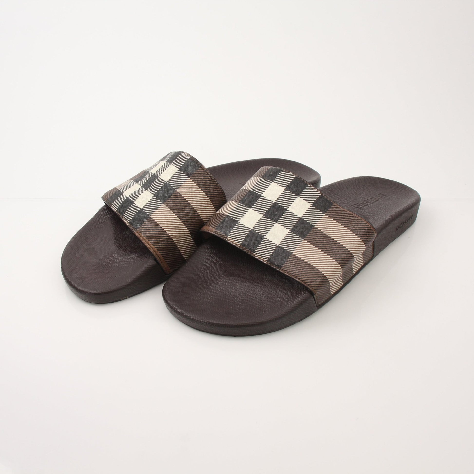 Gold & Beyond Burberry Men’s Furley Check Slide Sandals showing stylish checkered pattern and comfortable slip-on design.
