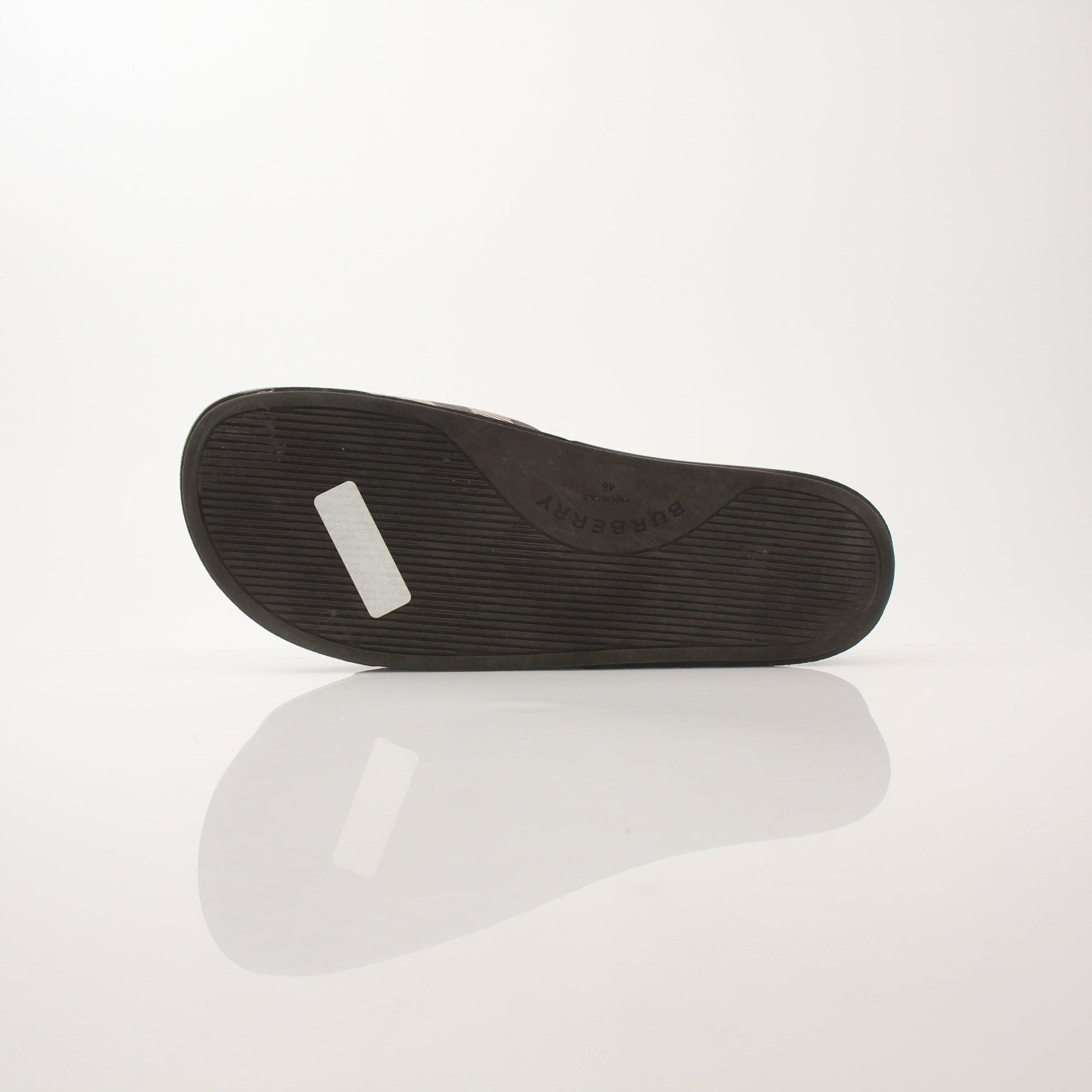 Gold & Beyond Burberry Men’s Furley Check Slide Sandals with black and beige check pattern and open-toe design.