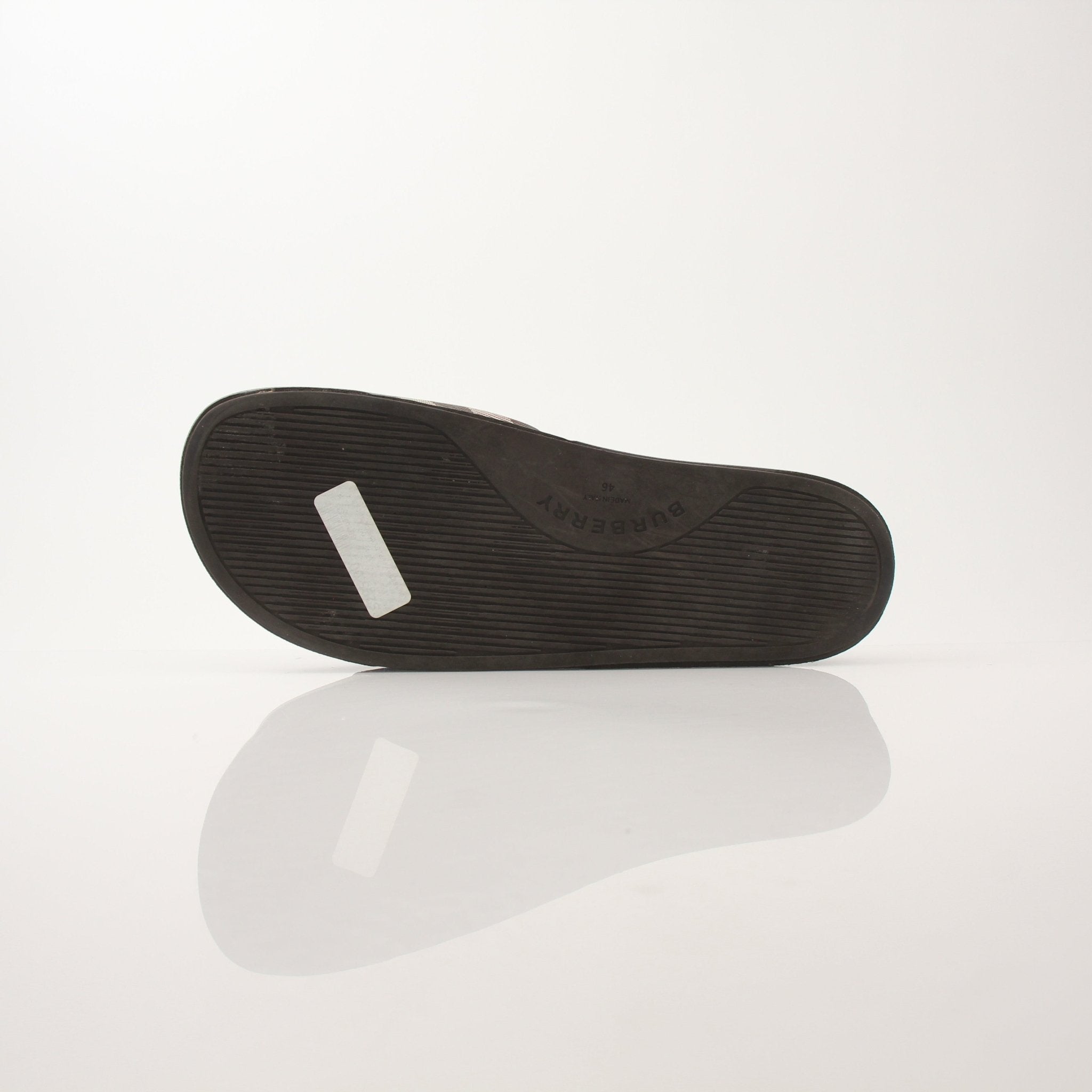 Gold & Beyond Burberry Men’s Furley Check Slide Sandals with black and beige check pattern and open-toe design.