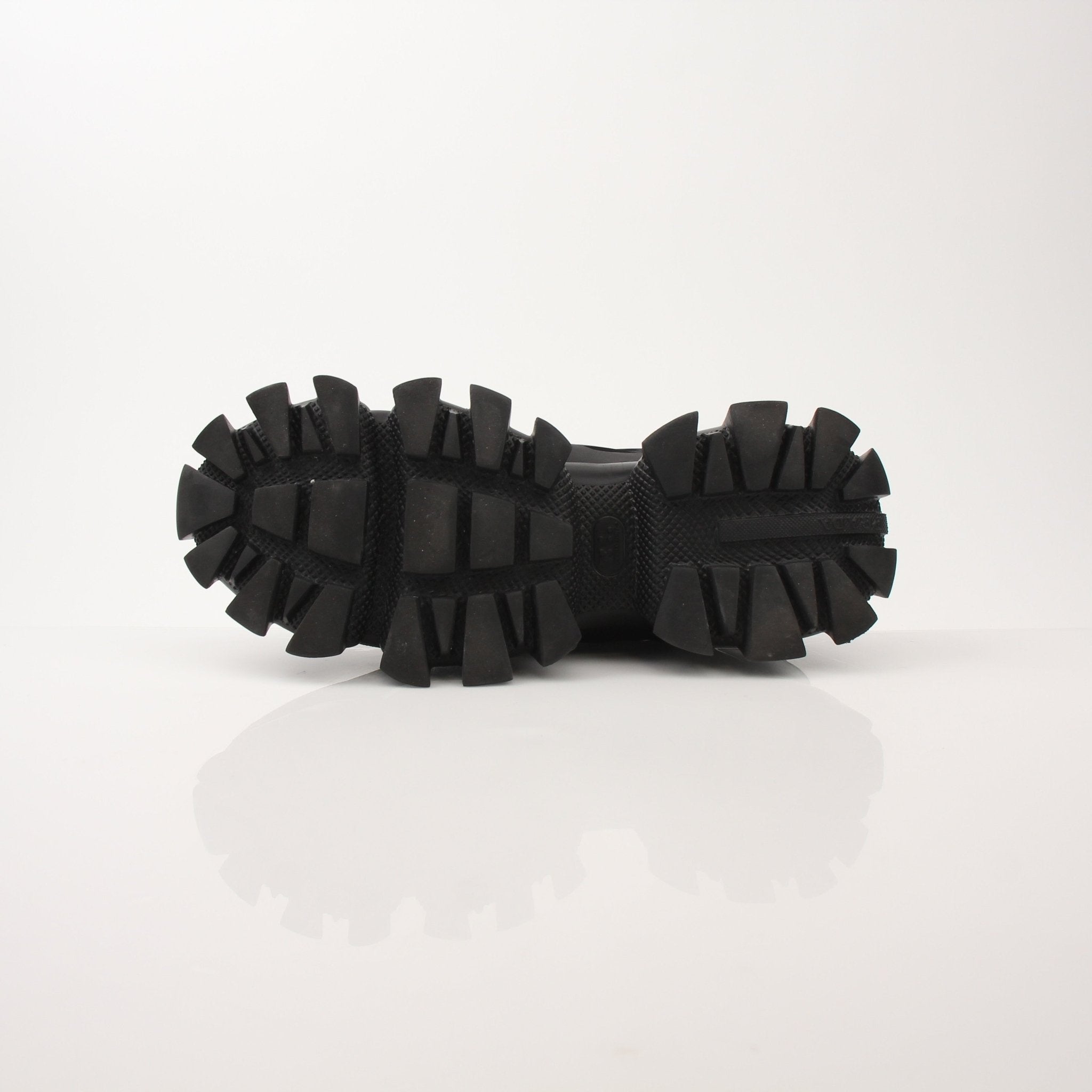 Prada Men’s Cloudbust Thunder knit fabric sneakers with sporty design, displayed on a white background.