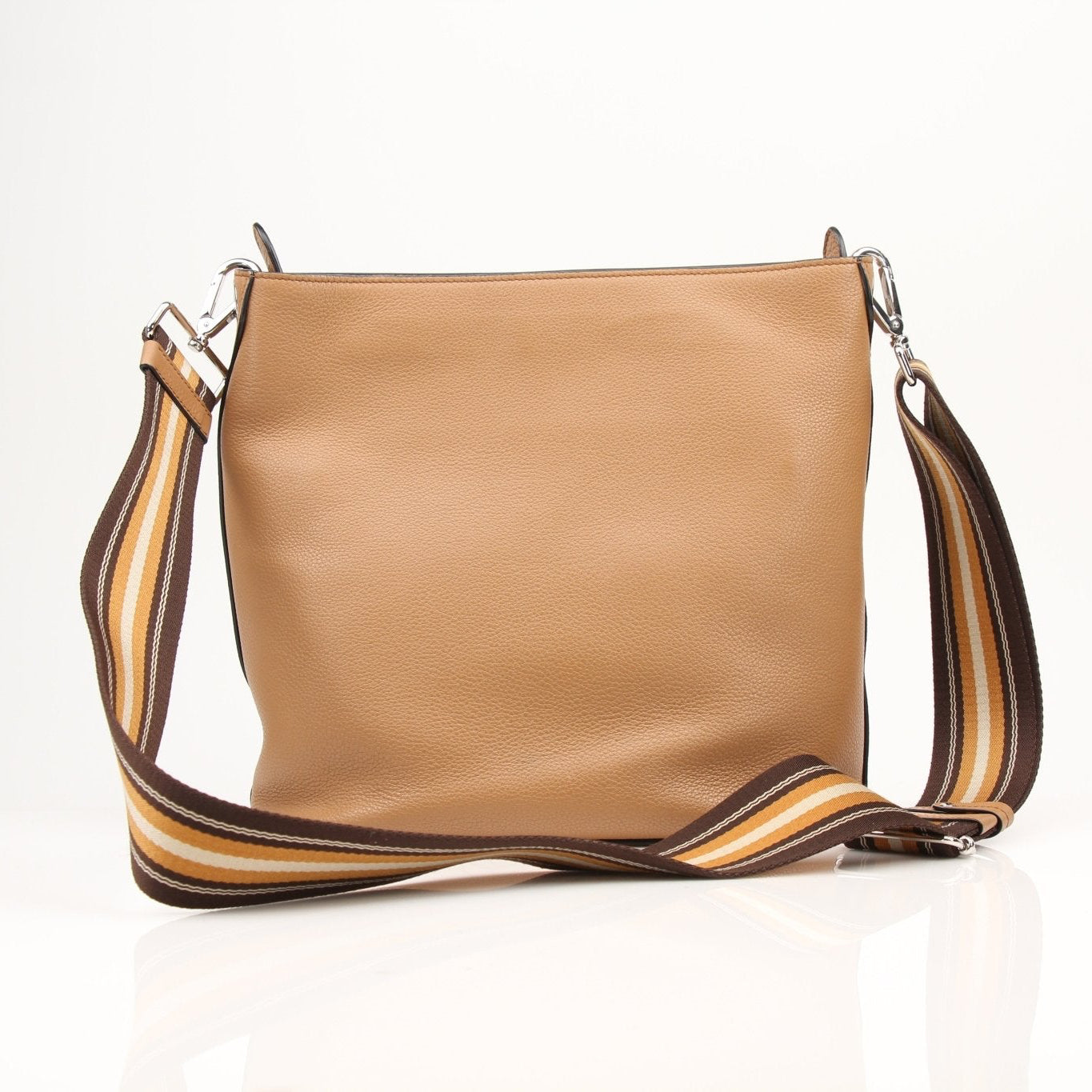 Prada Phenix bucket handbag with leather strap and metal hardware, stylish and spacious for everyday use.