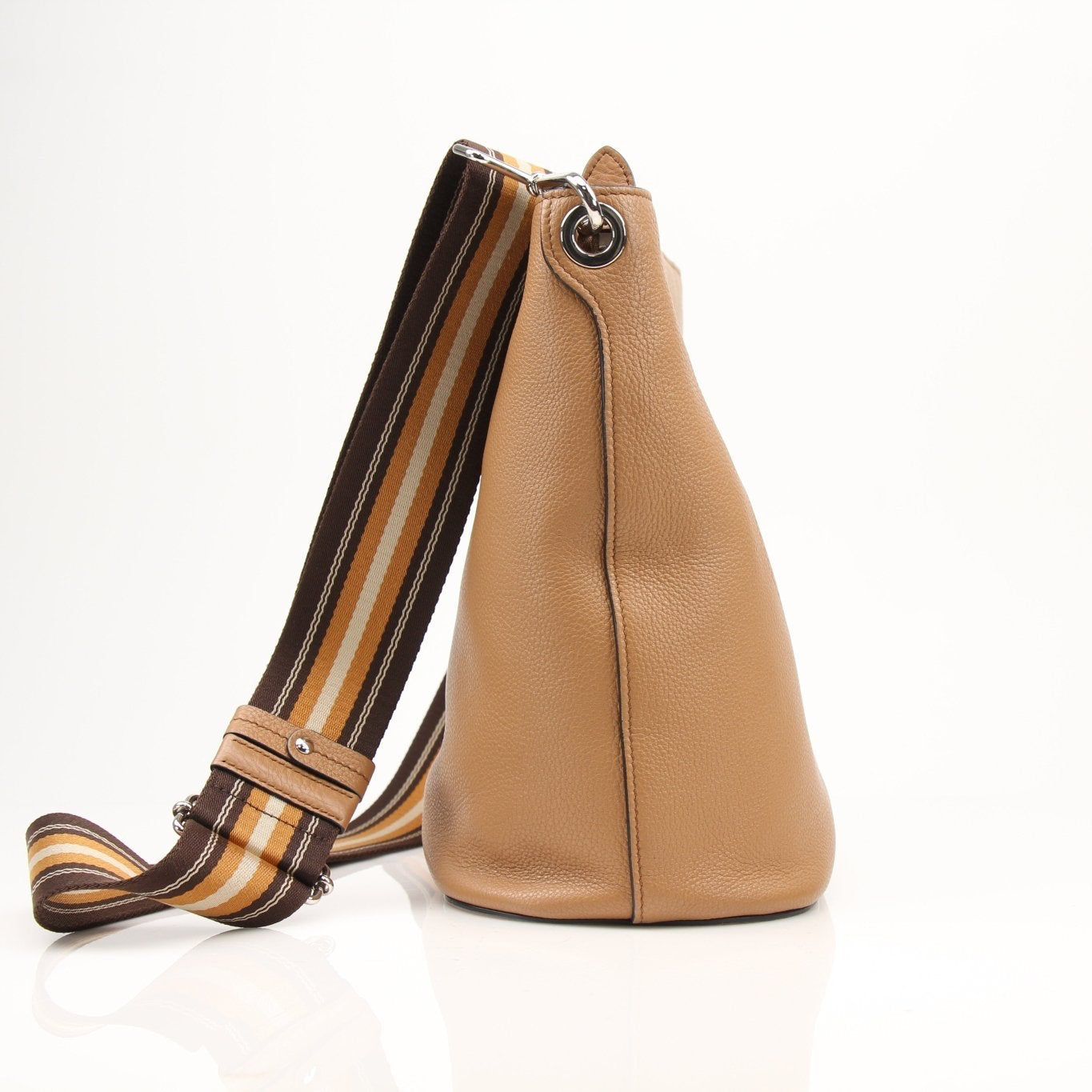 Prada Phenix bucket handbag with leather strap and designer logo, showcasing a stylish, high-end accessory for everyday use.