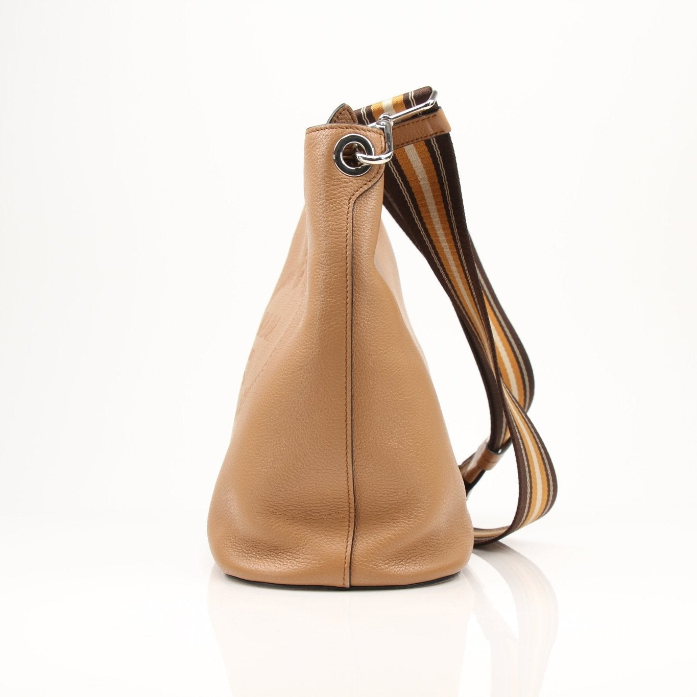 Prada Phenix bucket handbag with leather strap and metal hardware, featuring the iconic Prada logo on the front.
