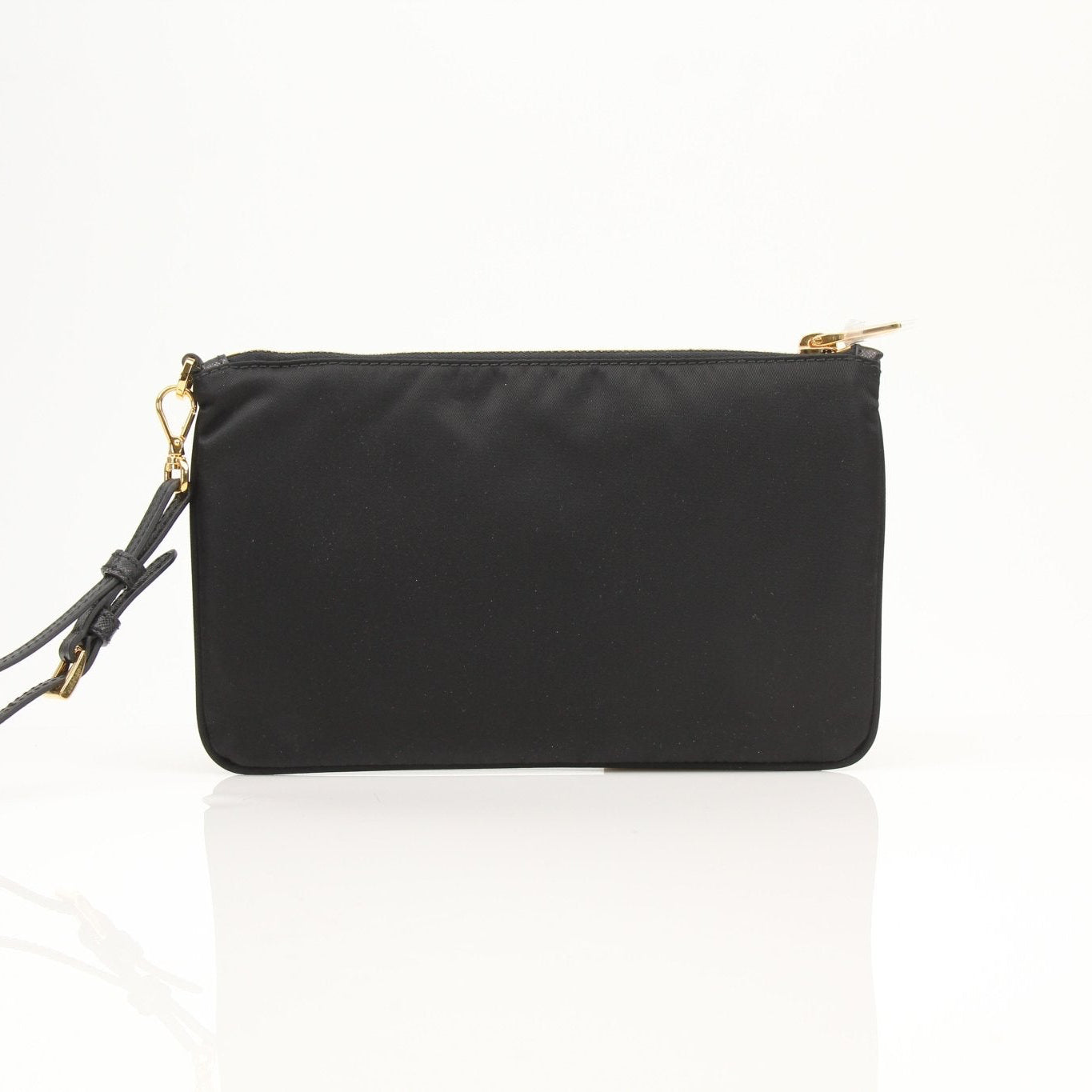 Prada black Re-Nylon wristlet with silver hardware, featuring a sleek rectangular shape and minimalist design.