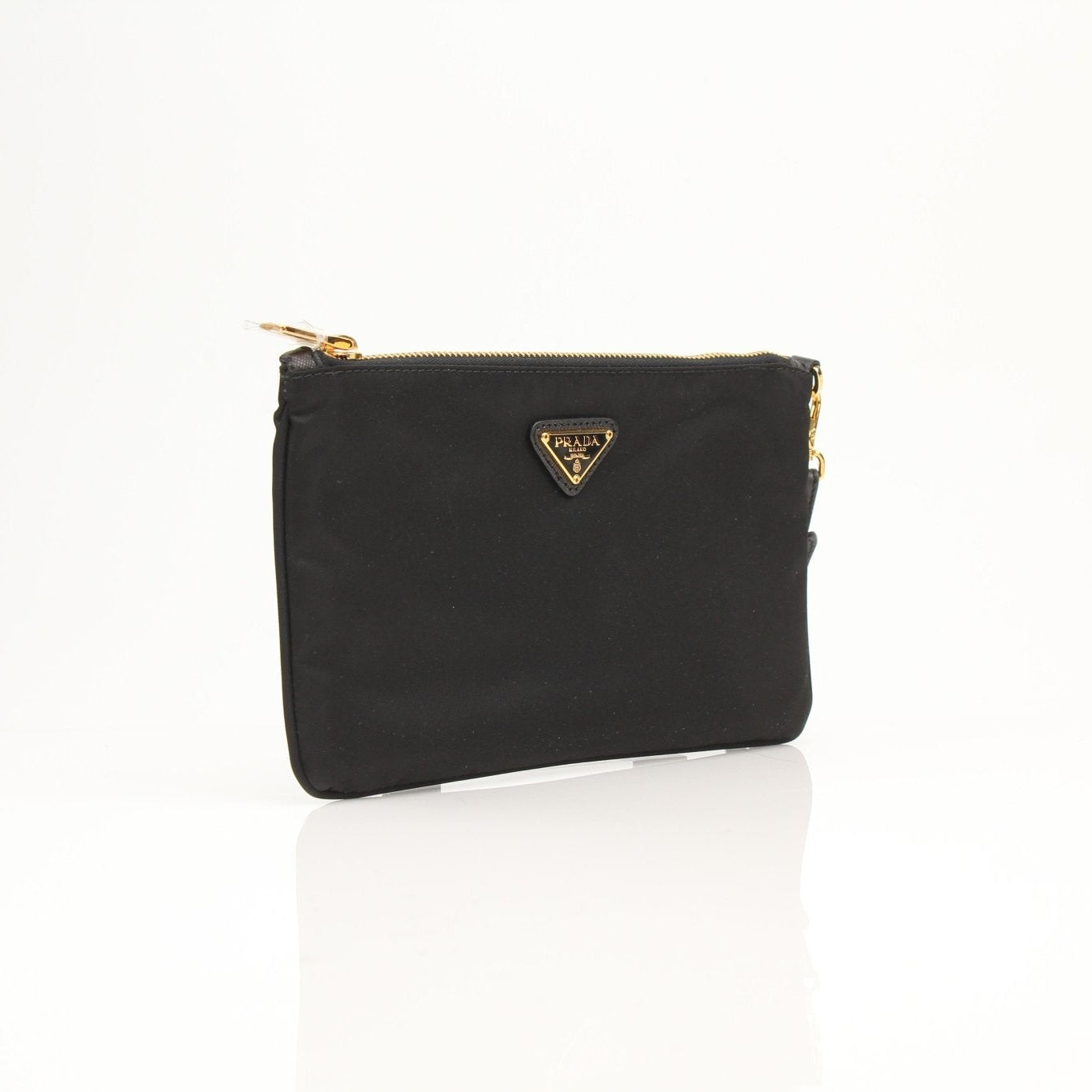 Prada black Re-Nylon wristlet with sleek design, featuring a zipper closure and compact size for everyday essentials.