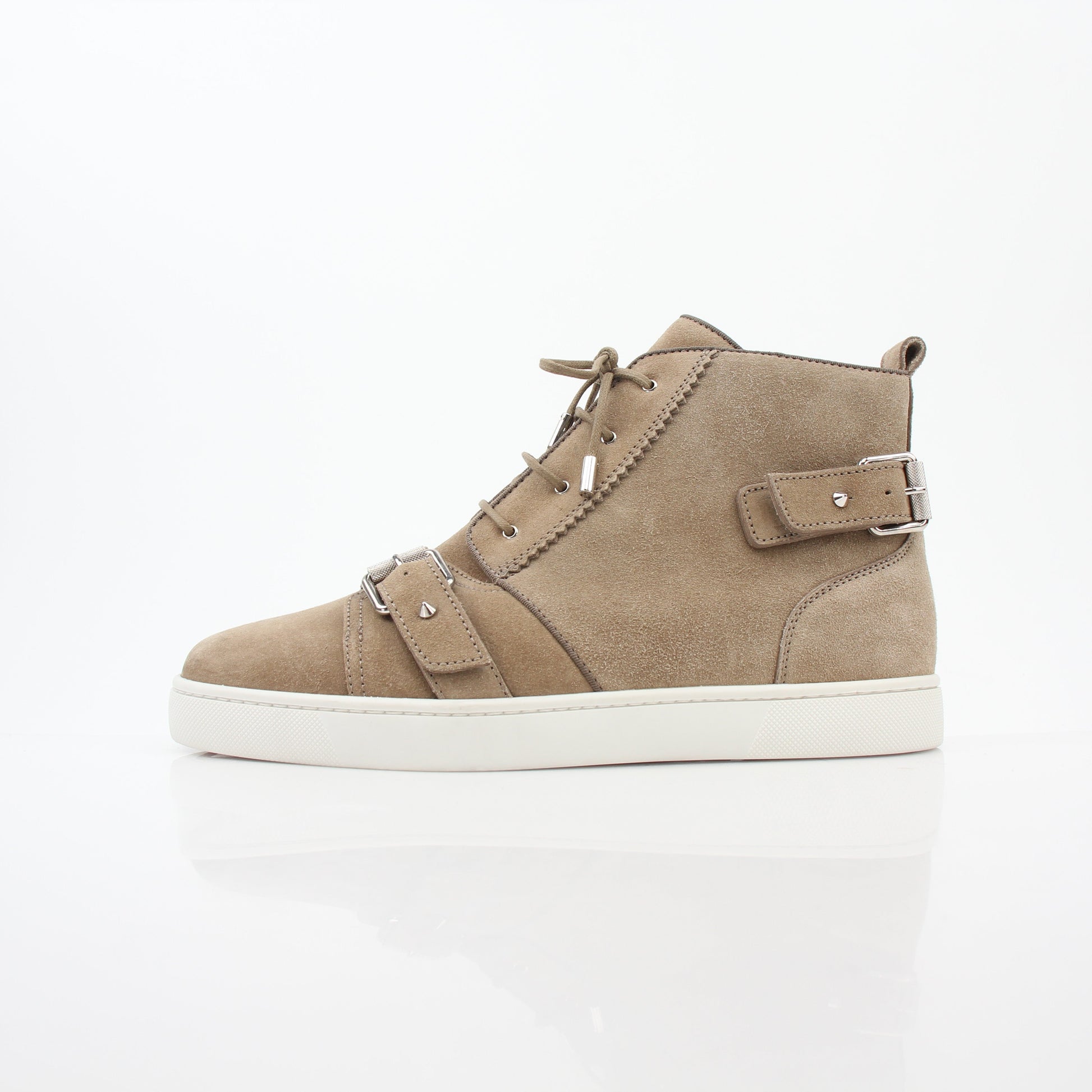 Christian Louboutin taupe Nono strap flat high-top sneakers with sleek design and signature detailing, shown from a side angle.