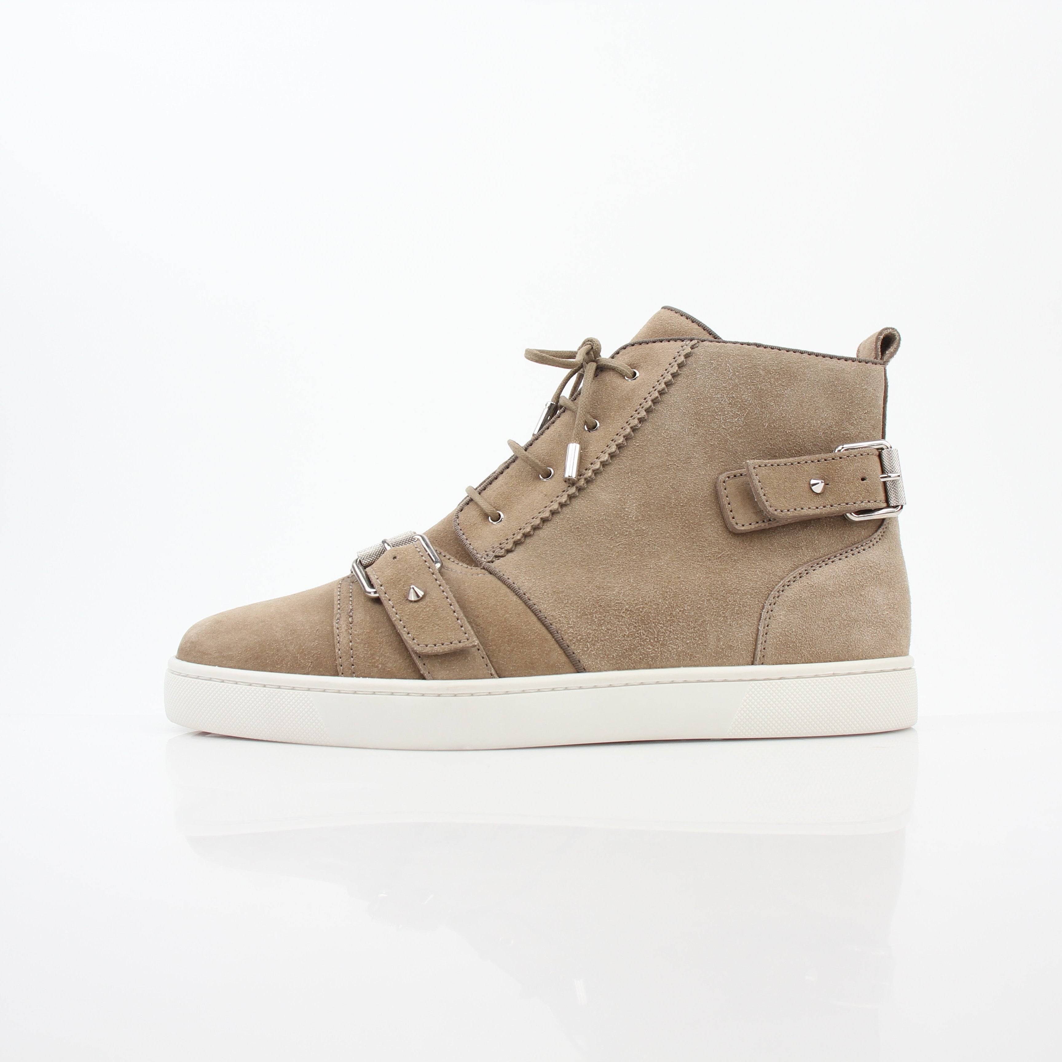 Christian Louboutin taupe Nono strap flat high-top sneakers with sleek design and signature detailing, shown from a side angle.