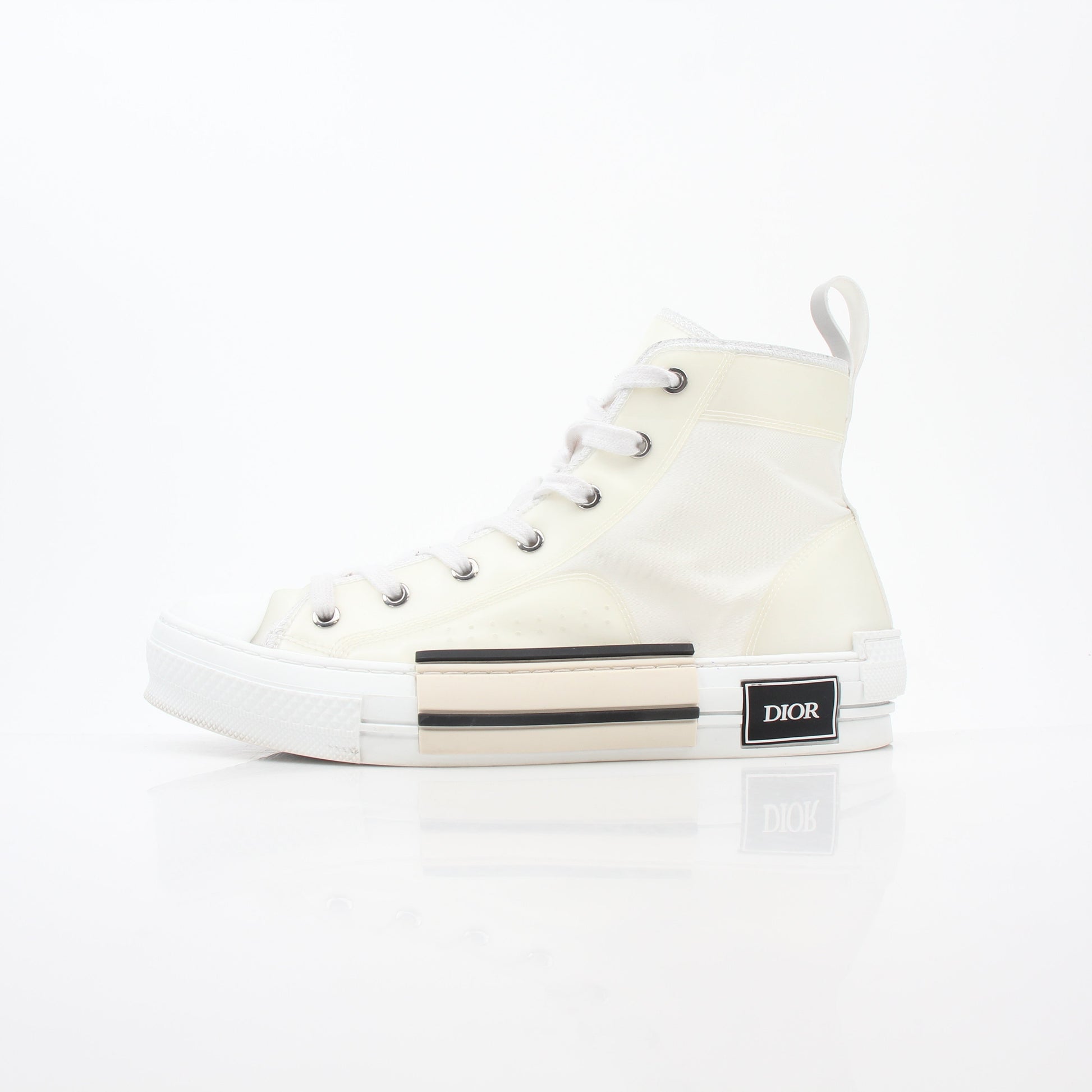 Christian Dior White B23 high-top sneakers, stylish shoes with logo details, displayed on a clean background.