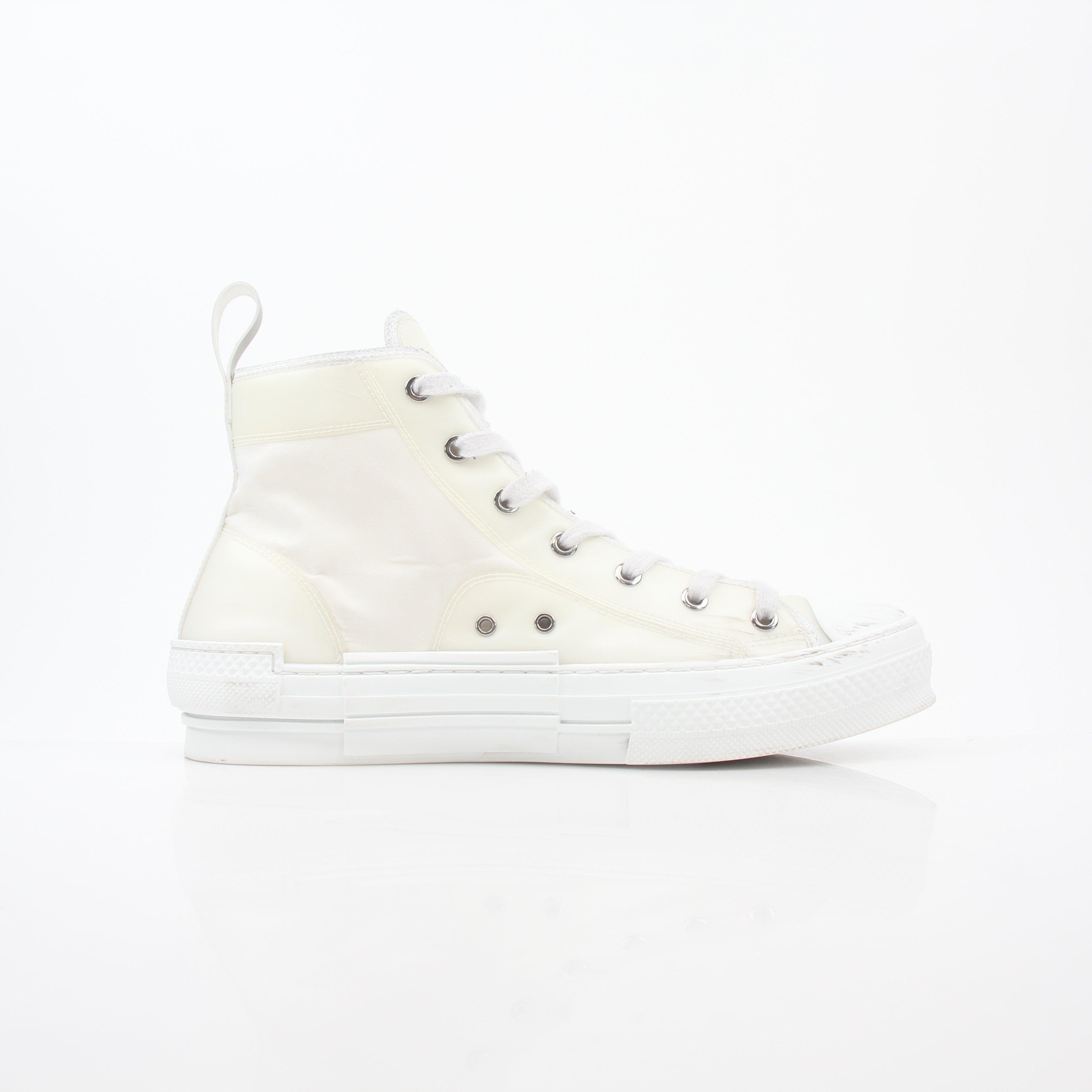 Christian Dior White B23 high-top sneakers for men, featuring Nike-style design with gold accents and a sporty look.