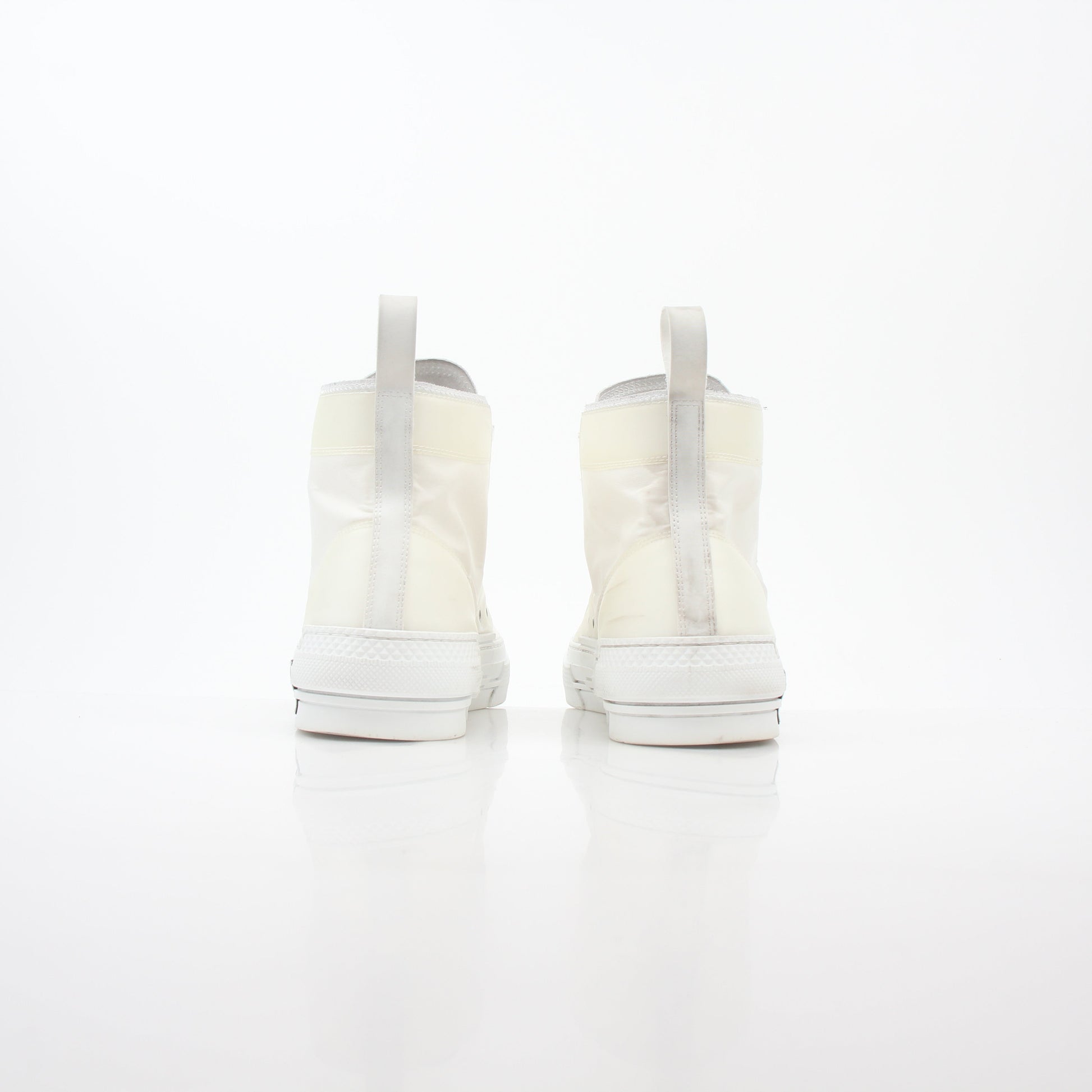 Christian Dior White B23 high-top sneakers by Gold & Beyond, showcasing sleek design and white leather material