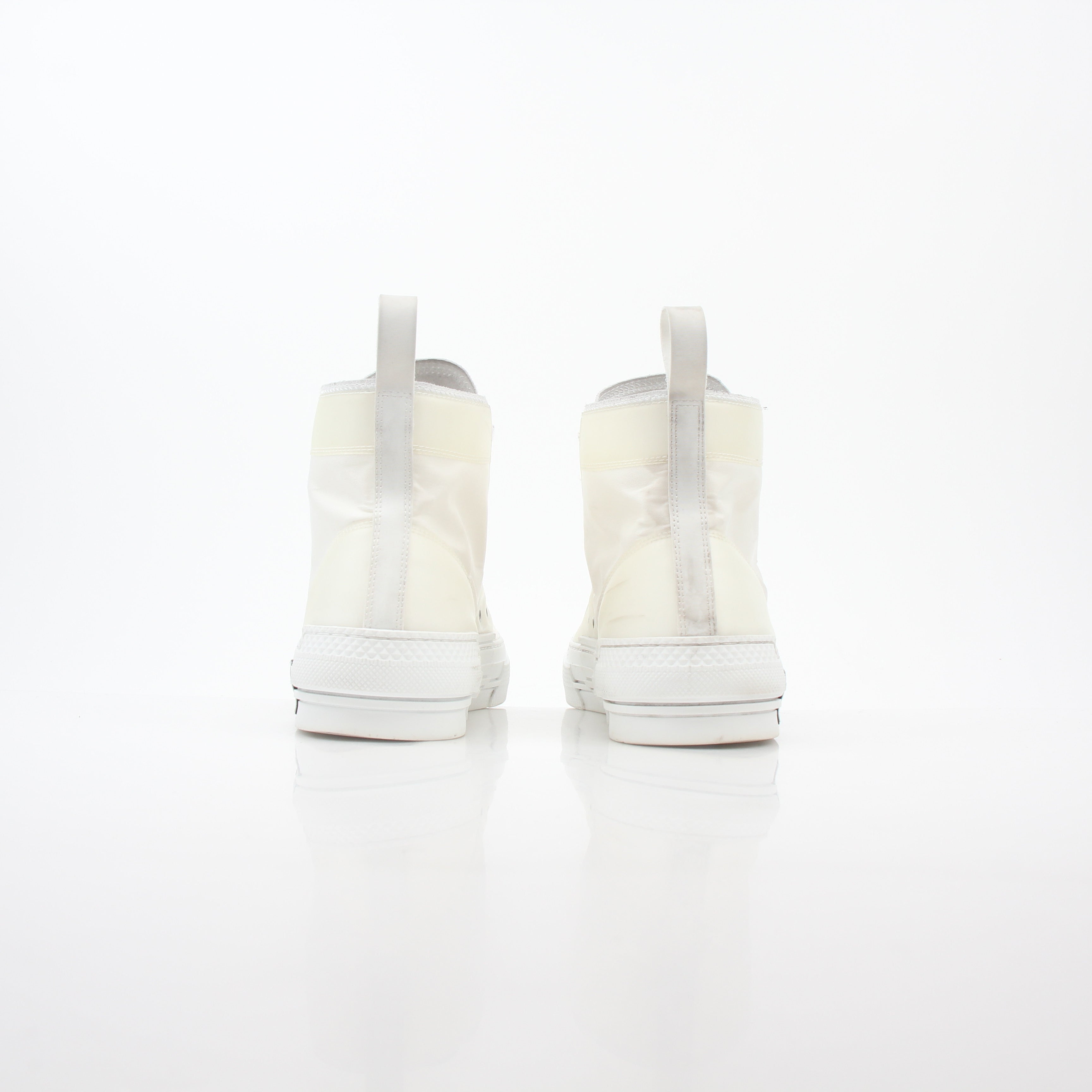 Christian Dior White B23 high-top sneakers by Gold & Beyond, showcasing sleek design and white leather material