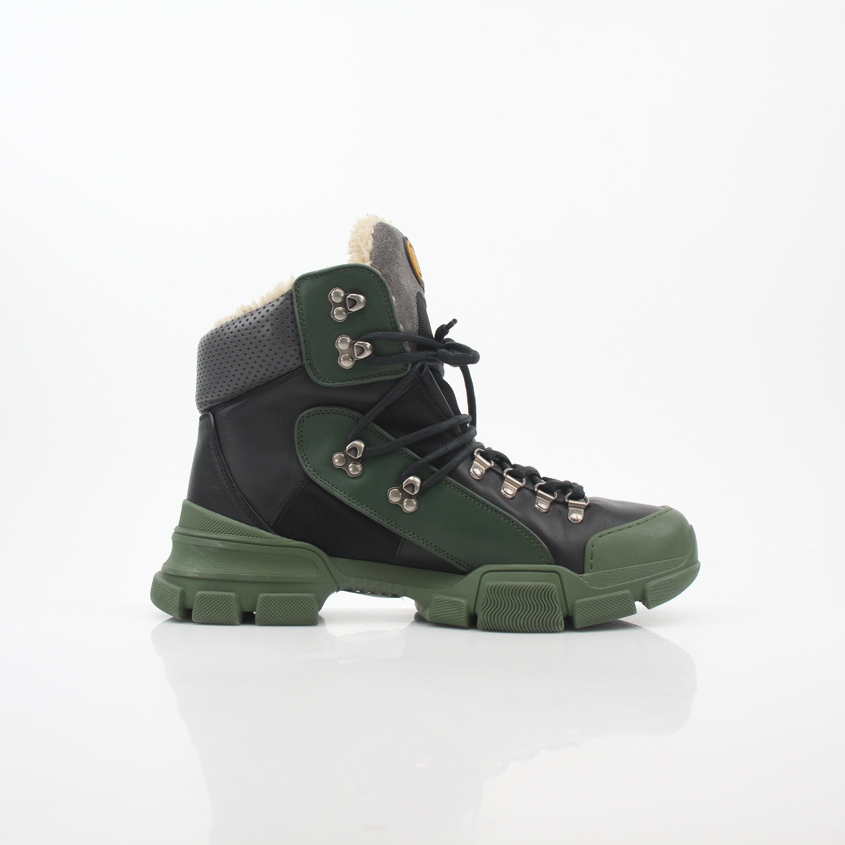 Gucci Green and Black Flashtrek high-top hiking shoes with rugged design and sturdy sole, by Gold & Beyond.