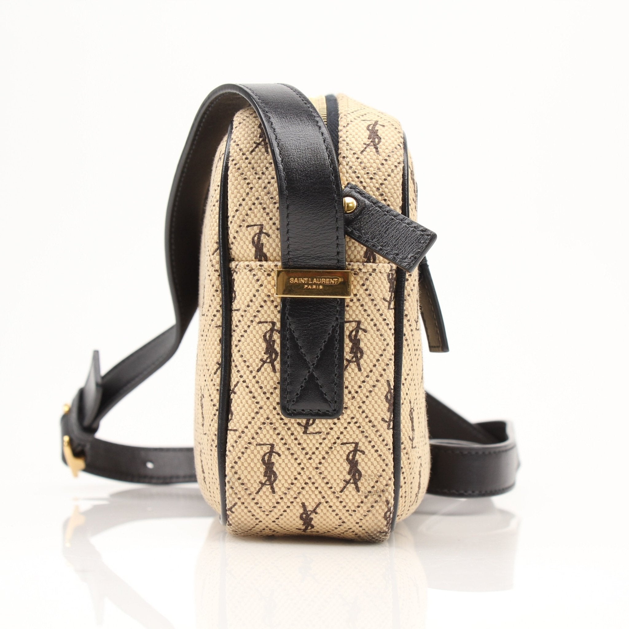 YSL brown monogram camera handbag with gold hardware and adjustable strap, stylish accessory for everyday and evening use.