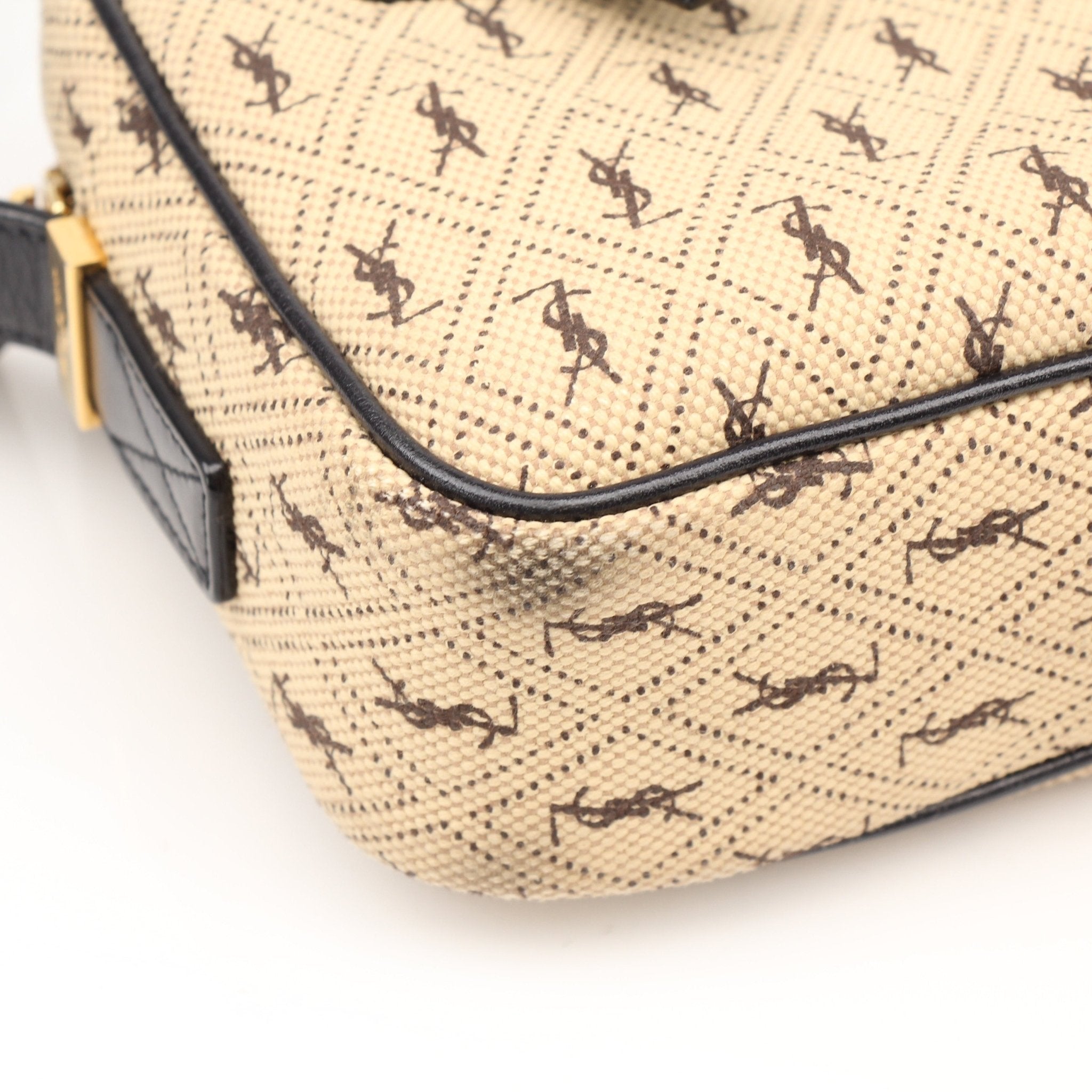 YSL brown monogram camera bag handbag with gold accents, featuring a compact design and stylish leather strap.