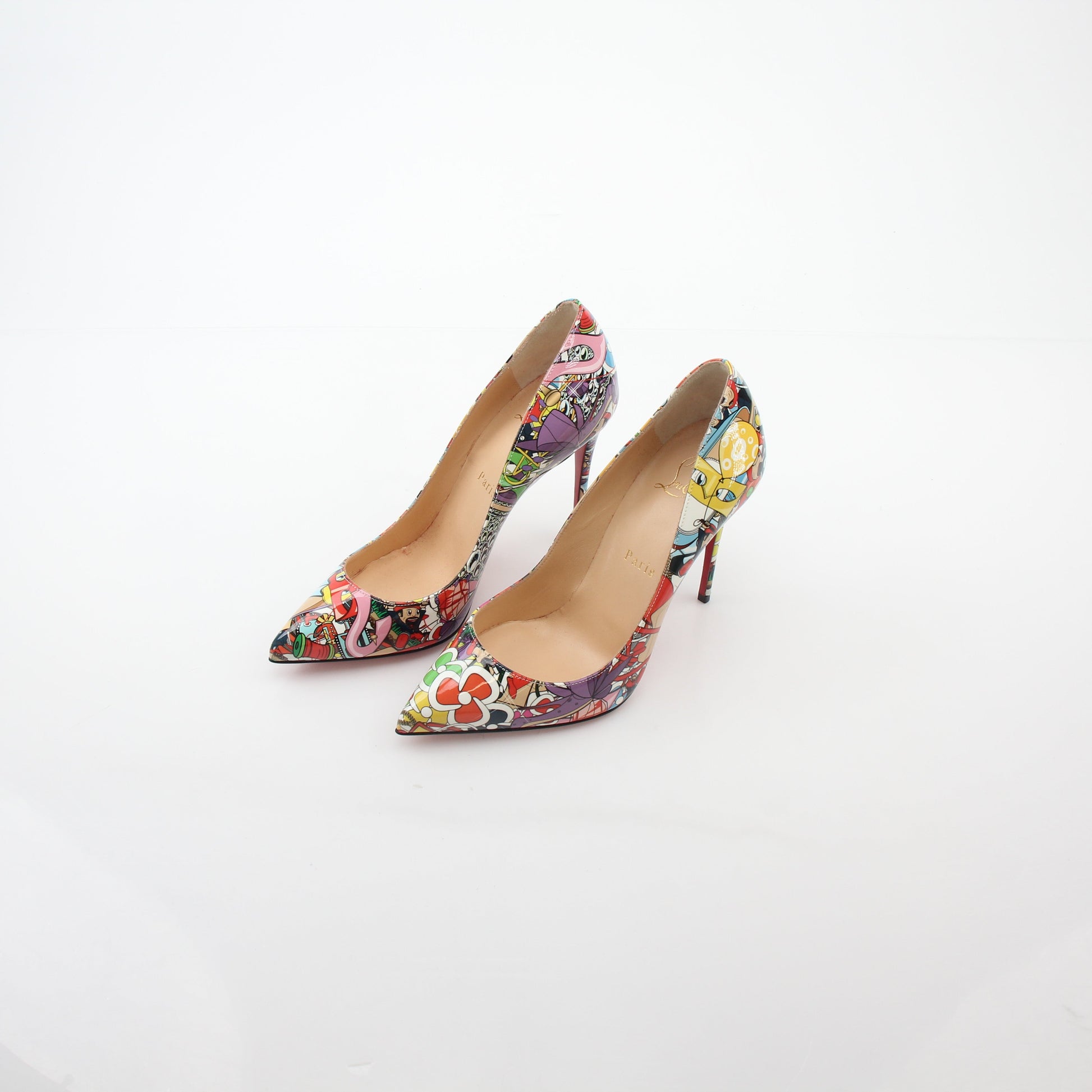 Christian Louboutin Multicolor Super Loubi Pigalle Follies 100 heels with signature red soles and vibrant color pattern.