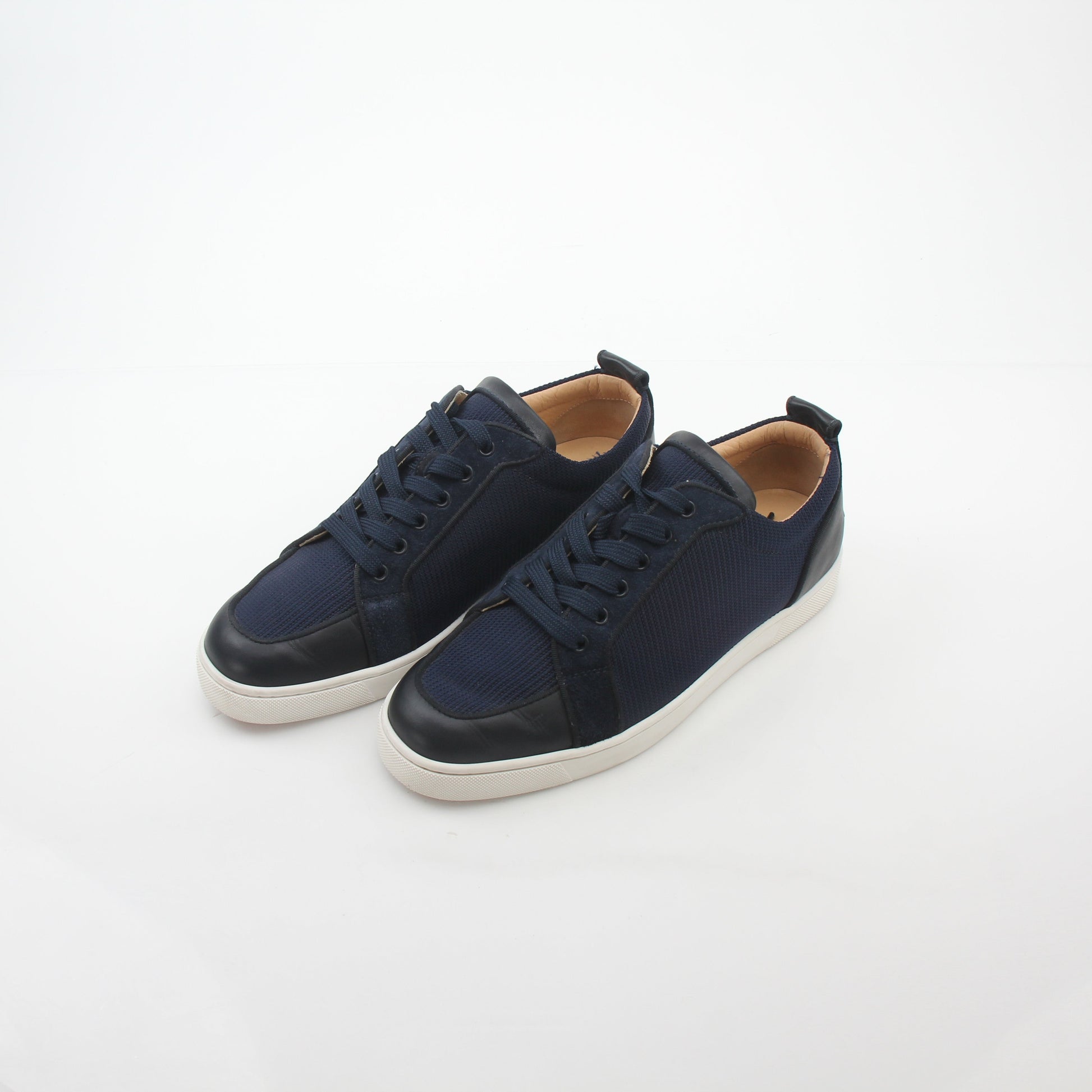Christian Louboutin Navy Rantulow Orlato low-top sneakers with gold accents, showcasing stylish shoes from Gold & Beyond.