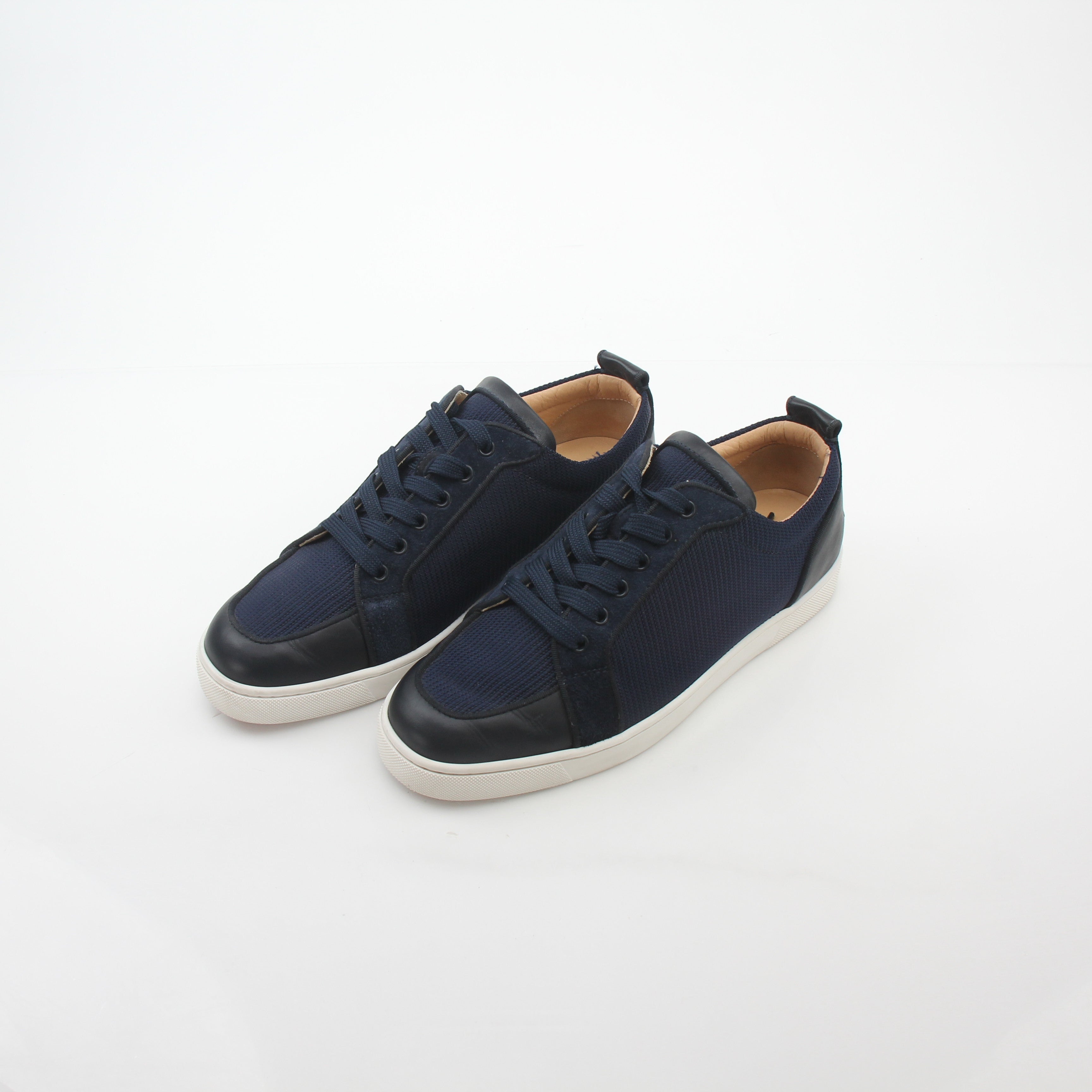Christian Louboutin Navy Rantulow Orlato low-top sneakers with gold accents, showcasing stylish shoes from Gold & Beyond.