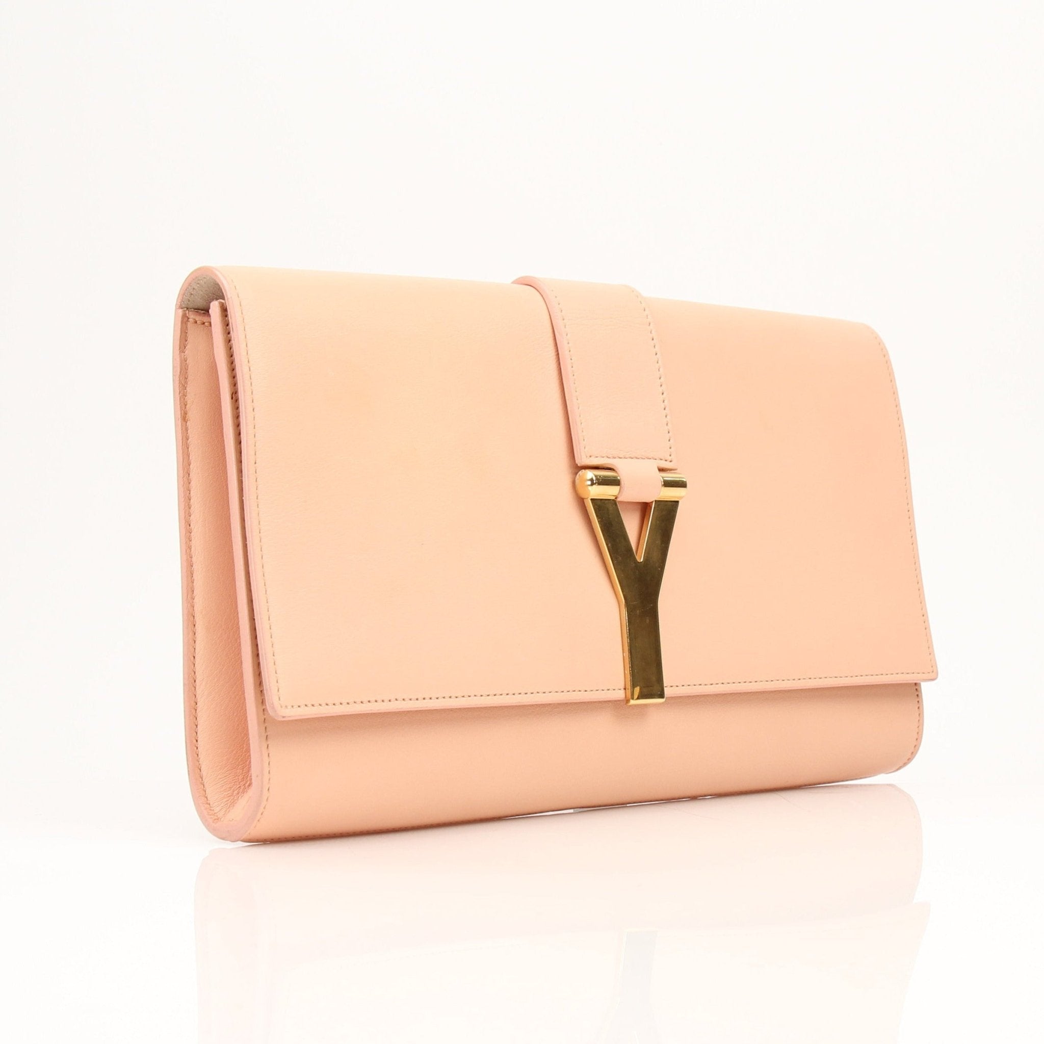 Gold & Beyond pink YSL Y-Mall clutch handbag with gold hardware and sleek design, featuring a fold-over style and wrist strap.