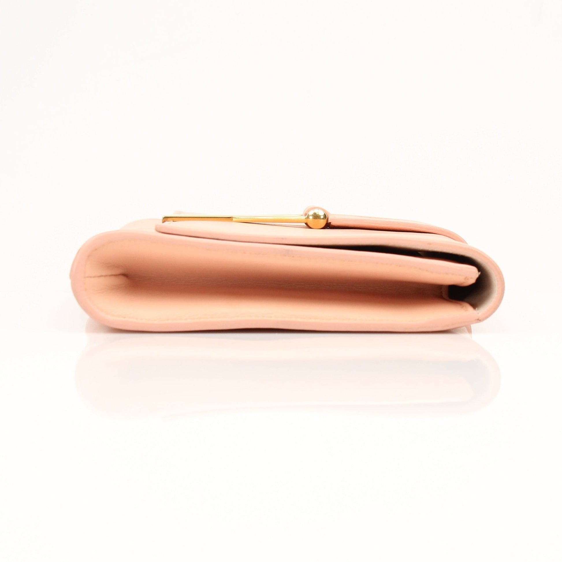 Gold & Beyond Pink YSL Y-Mall clutch handbag with sleek design and gold accents, perfect for stylish occasions.