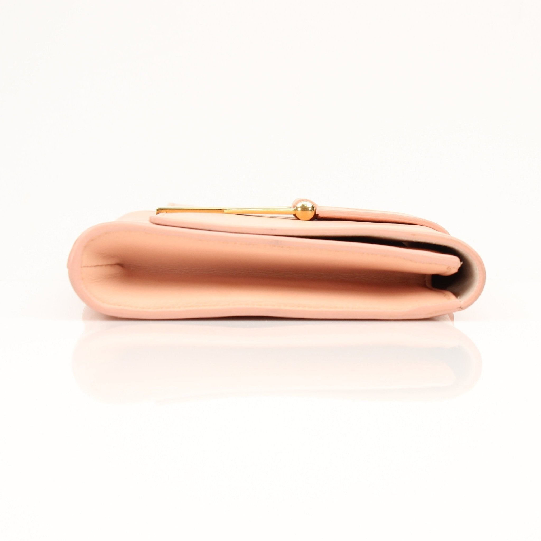 Gold & Beyond Pink YSL Y-Mall clutch handbag with sleek design and gold accents, perfect for stylish occasions.