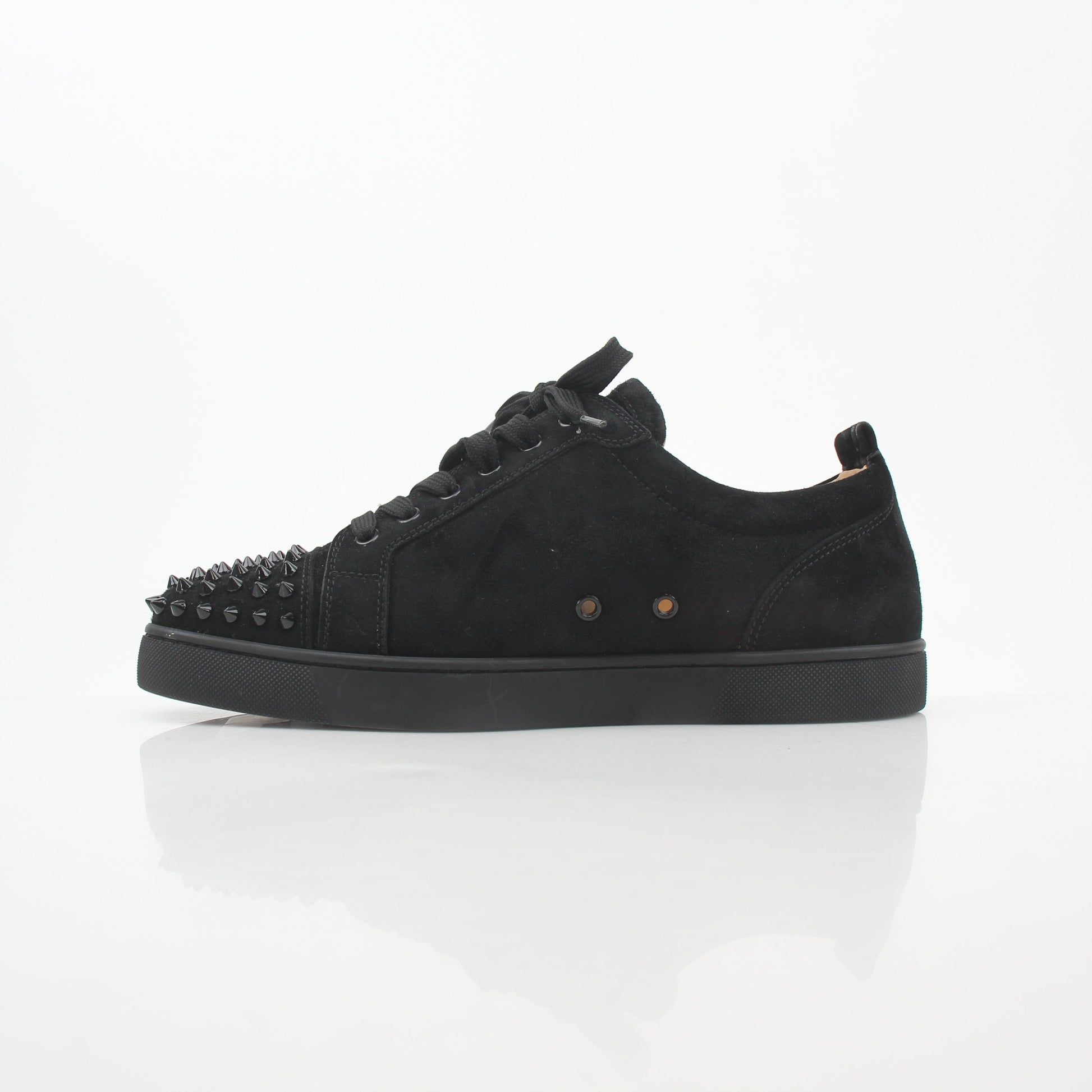 Christian Louboutin Black Louis Junior Spikes low-top sneakers with studded details and sleek design, made by Gold & Beyond.