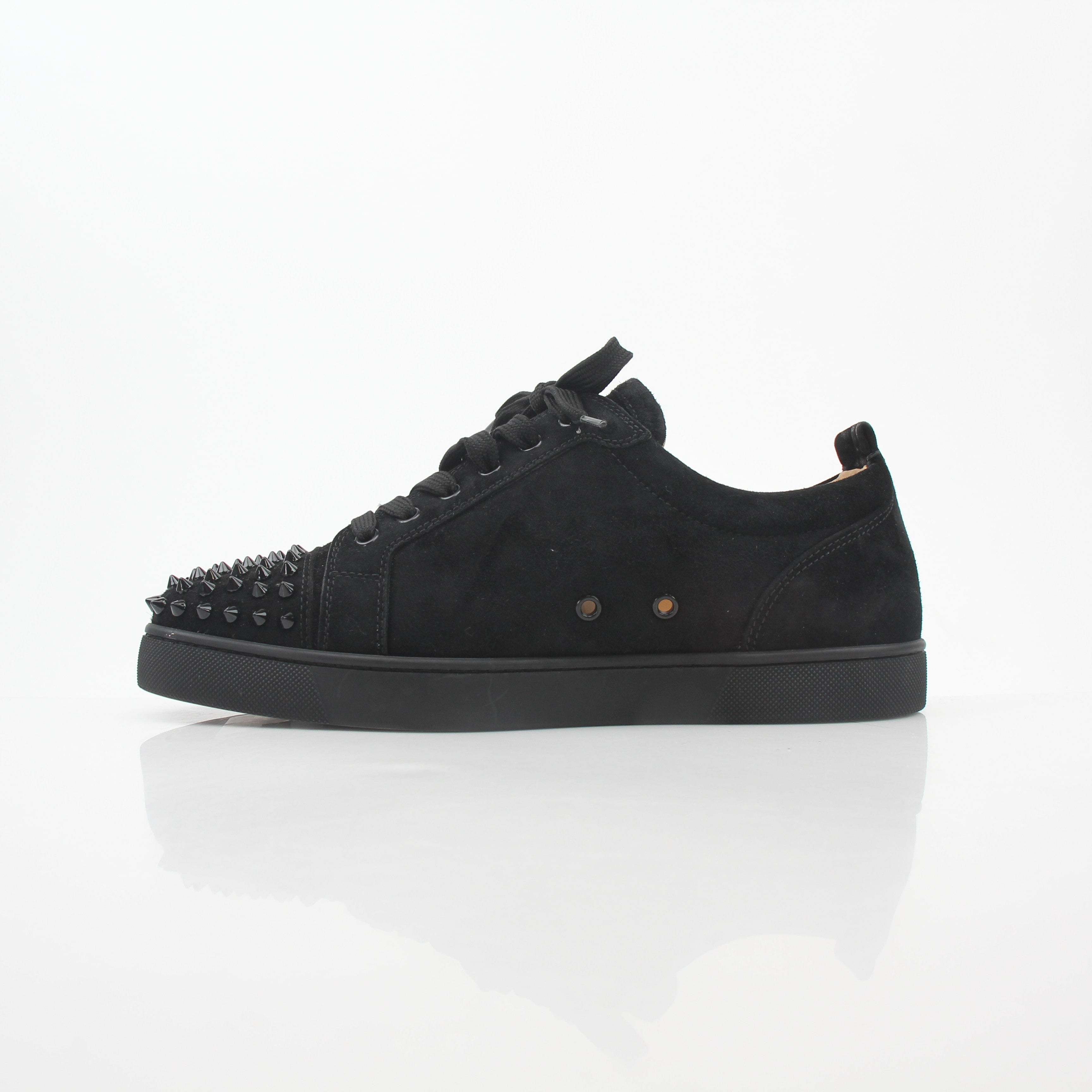 Christian Louboutin Black Louis Junior Spikes low-top sneakers with studded details and sleek design, made by Gold & Beyond.