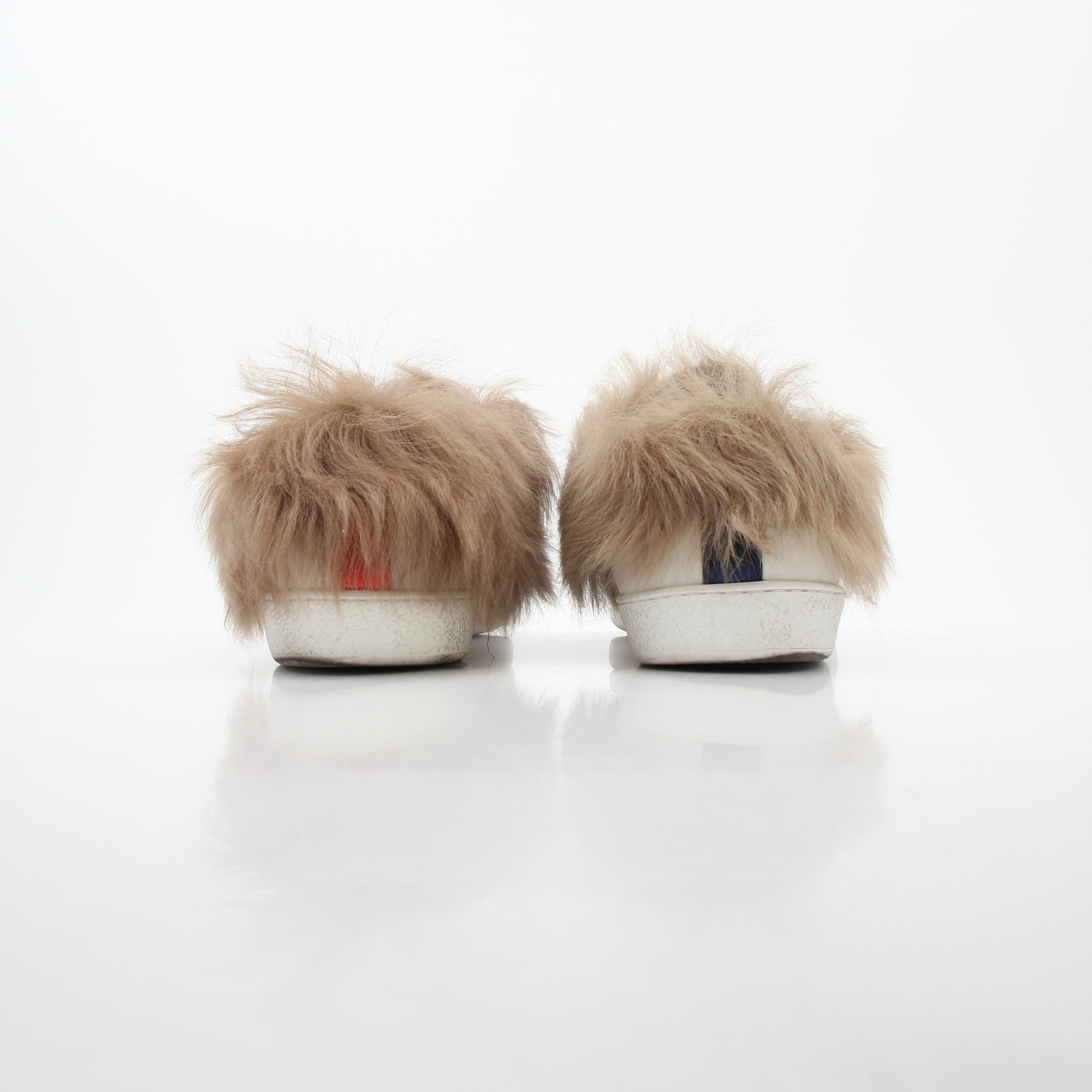 Gucci White Ace embroidered bee fur low-top sneakers, showcasing embroidered bee design and fur accents on smooth white leather.