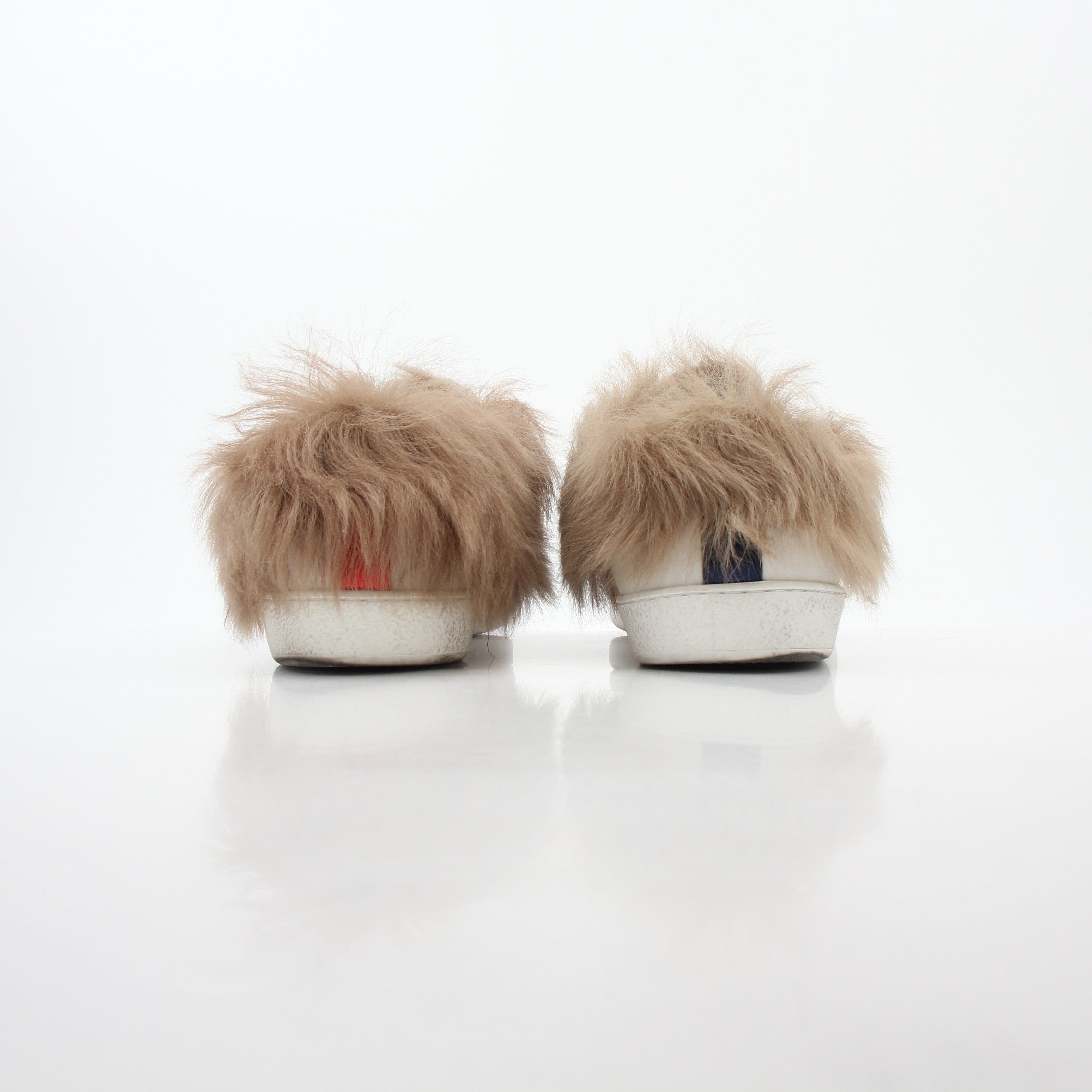 Gucci White Ace embroidered bee fur low-top sneakers, showcasing embroidered bee design and fur accents on smooth white leather.