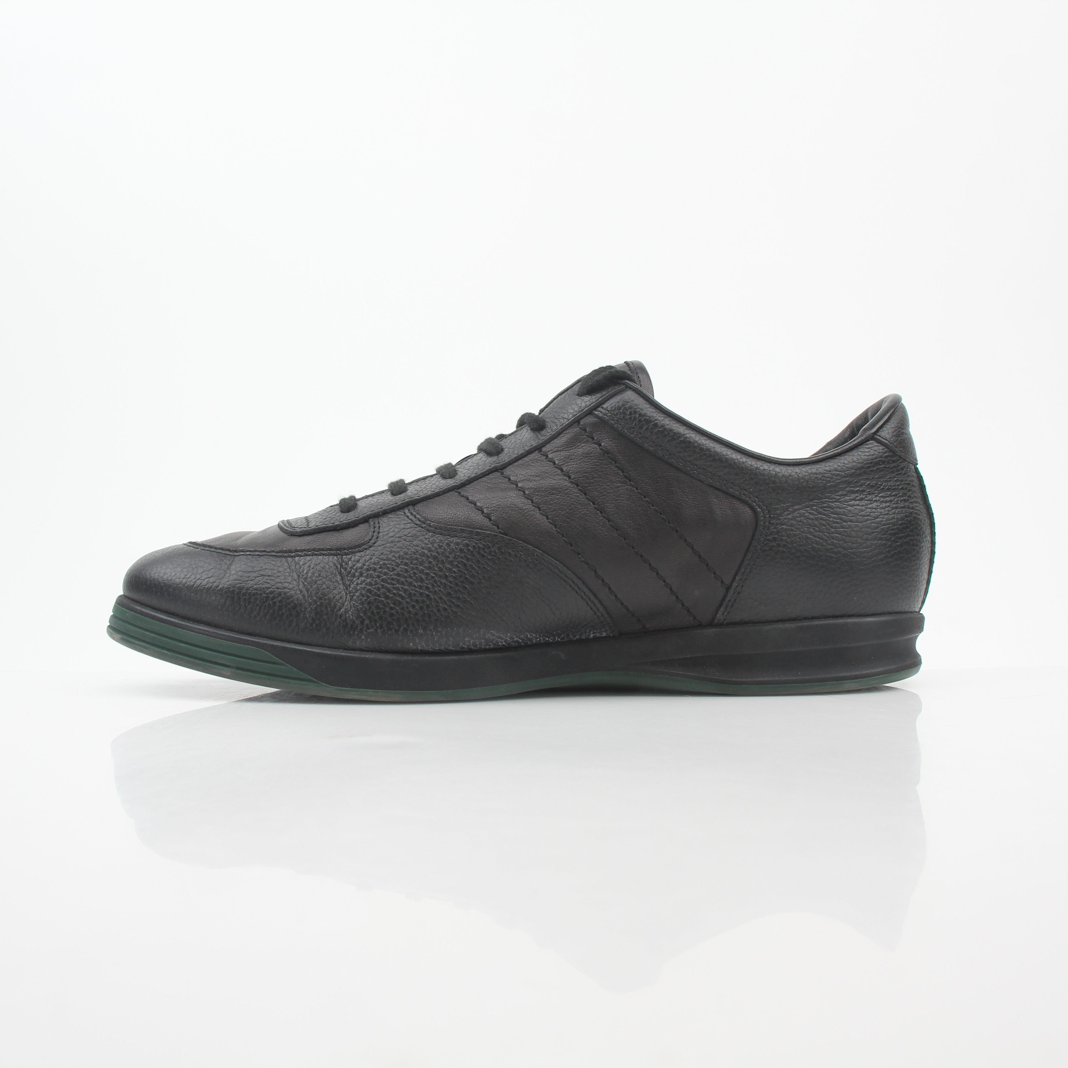 Gold & Beyond Gucci Black Tennis 1984 low-top sneakers with white laces and rubber soles, casual athletic shoes for men.