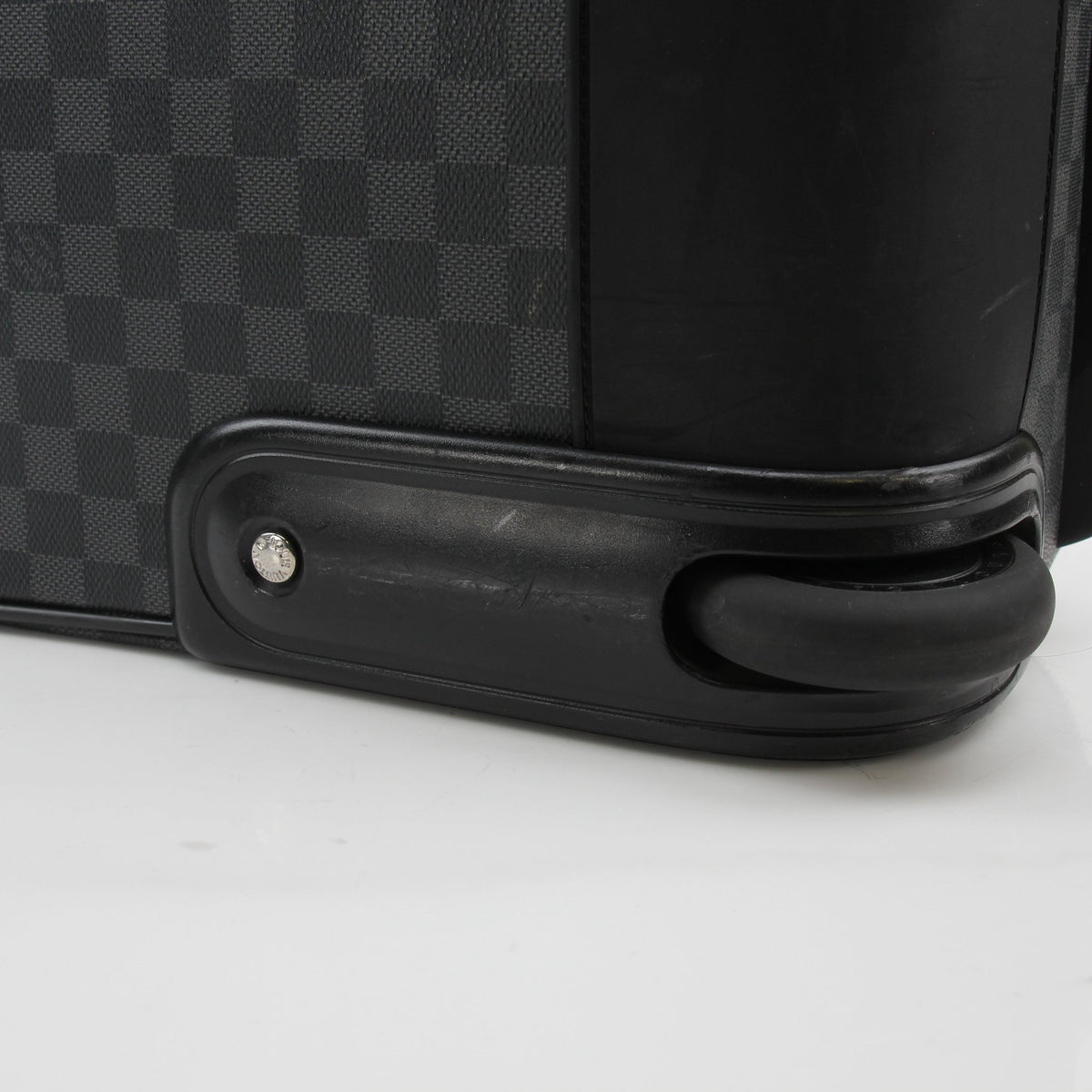 Louis Vuitton Damier Graphite Pégase 45 rolling luggage with wheels and telescoping handle, designed for travel and durability.