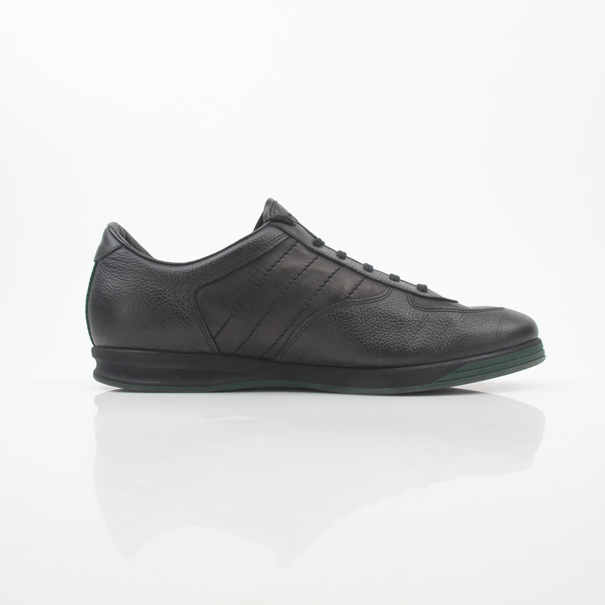 Gold & Beyond Gucci Black Tennis 1984 Low-Top Sneakers, stylish shoes with classic design and black leather finish.