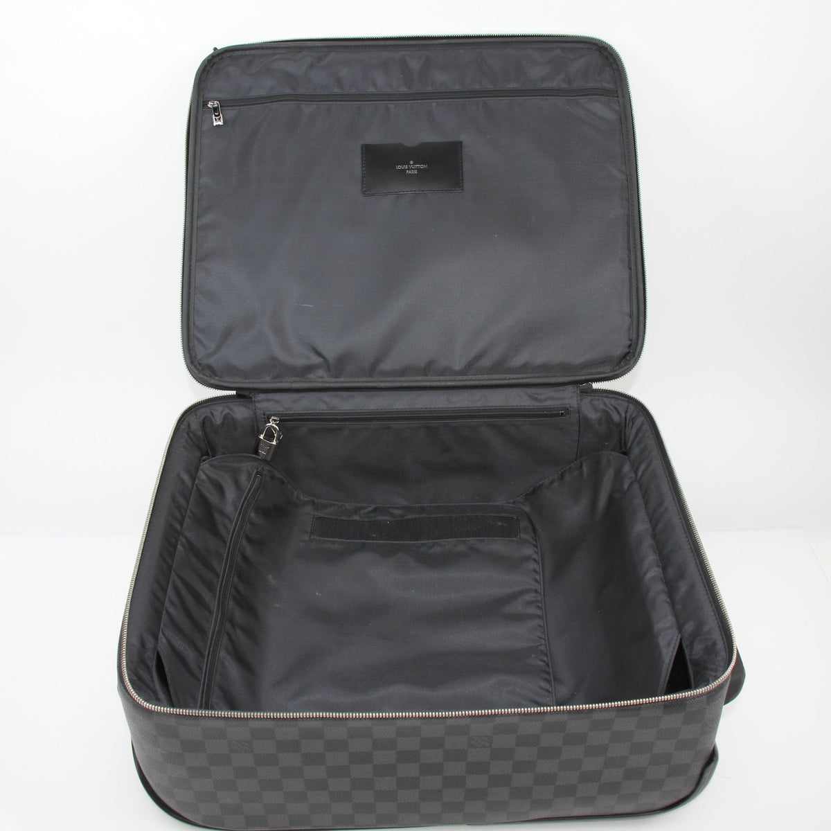 Louis Vuitton Damier Graphite Pégase 45 rolling luggage with extendable handle and four wheels, designed for travel.