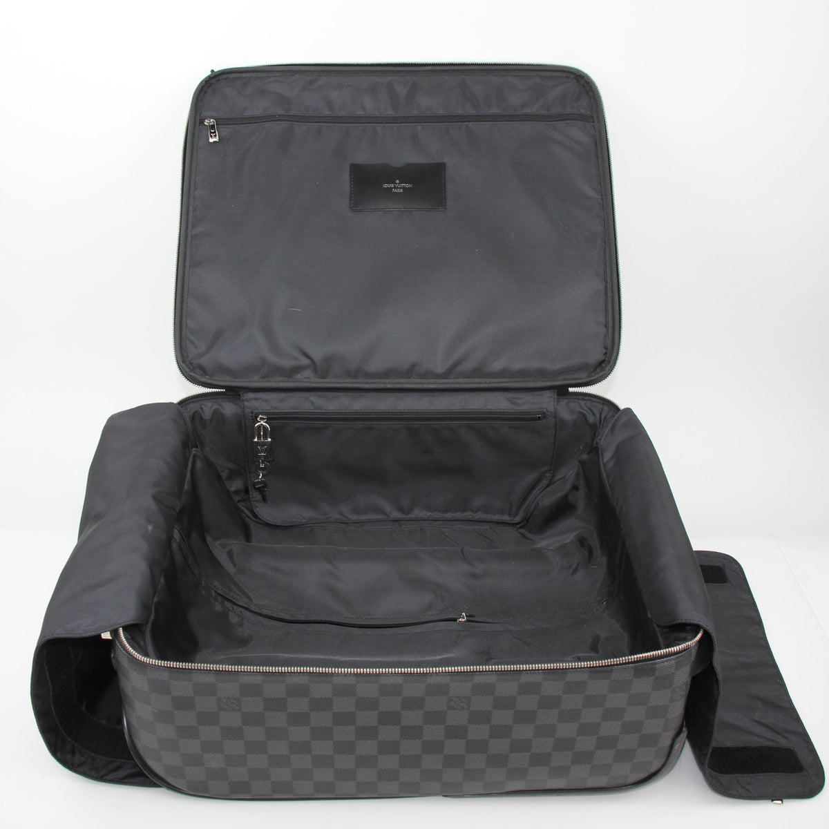 Louis Vuitton Damier Graphite Pégase 45 rolling luggage with retractable handle and four wheels, designed for travel and durability.