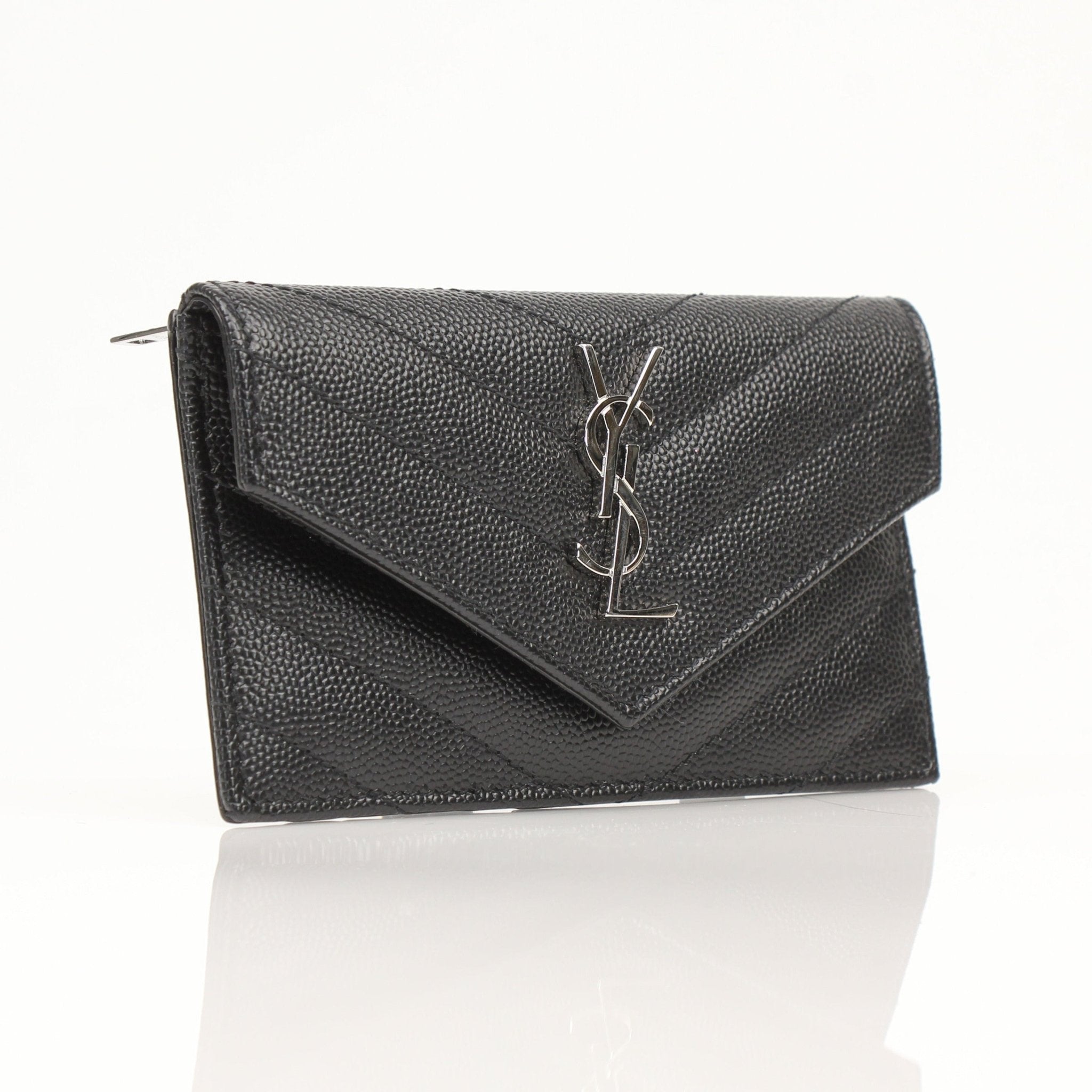Yves Saint Laurent Fragments Black Grain de Poudre flap wallet with silver YSL hardware, compact leather wallet by Gold & Beyond.