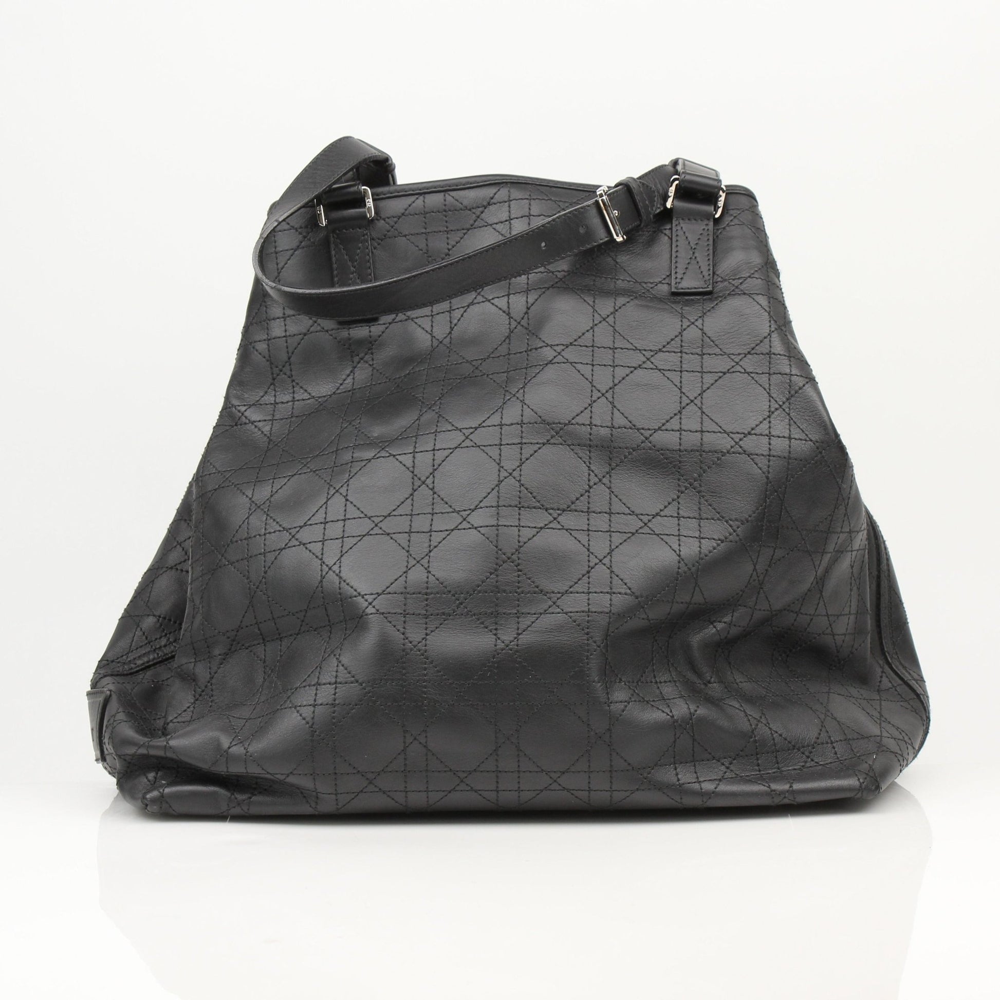 Christian Dior Rasta Cannage Tote travel bag with rasta-inspired design and gold-tone accents, crafted from premium materials.