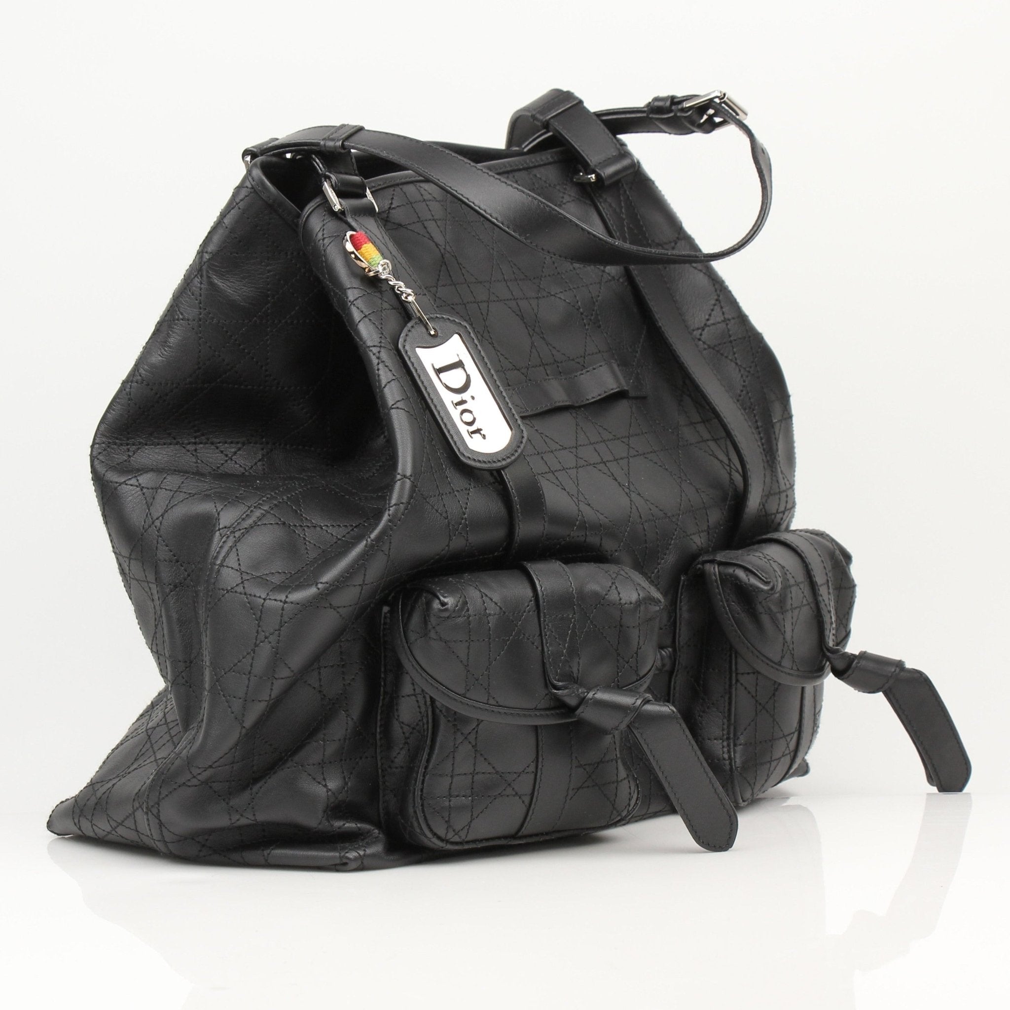 Christian Dior Rasta Cannage Tote bag, a stylish travel bag with vibrant rasta-inspired design and cannage pattern.