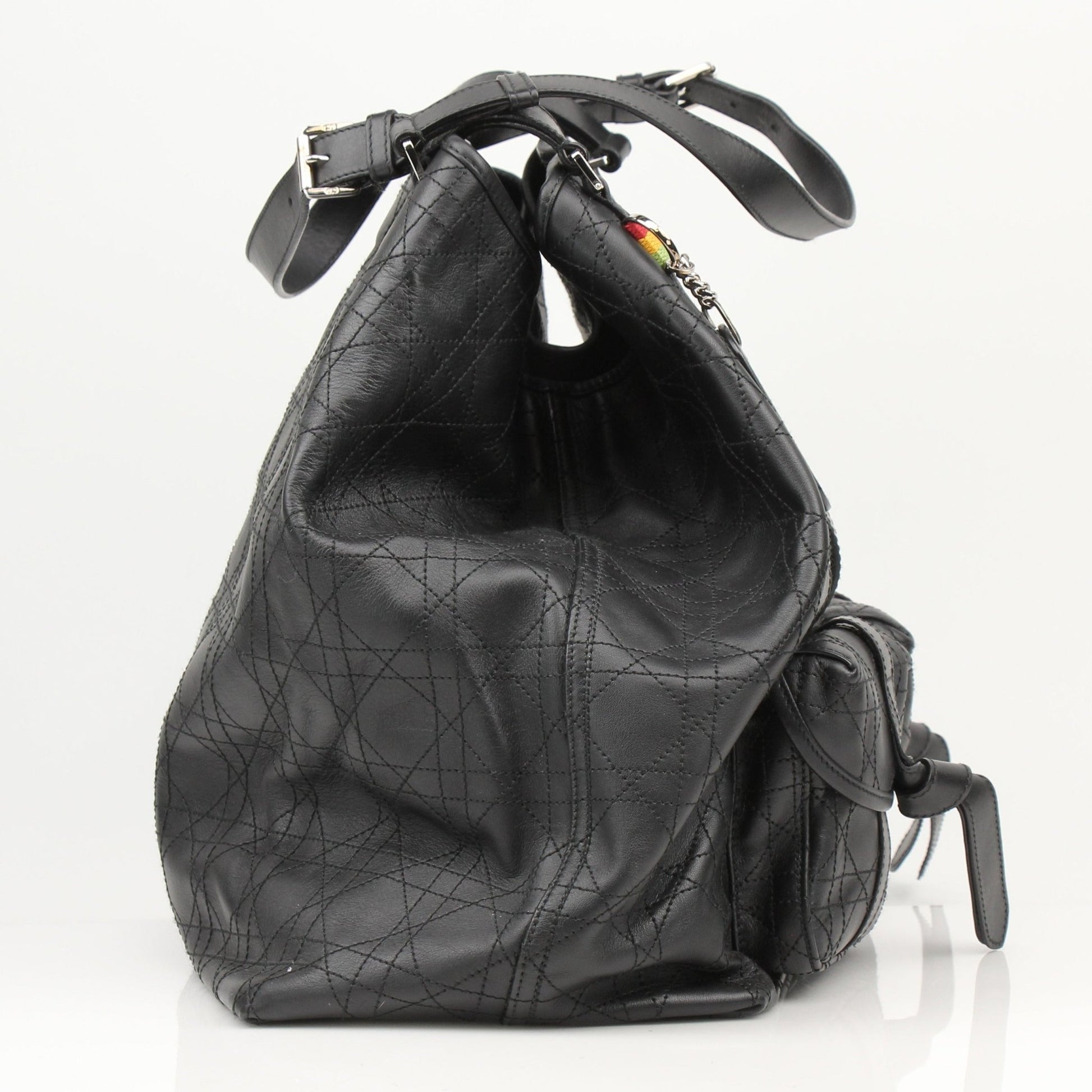 Christian Dior Rasta Cannage Tote travel bag with vibrant rasta-inspired design and gold-tone details, crafted with luxurious leather.