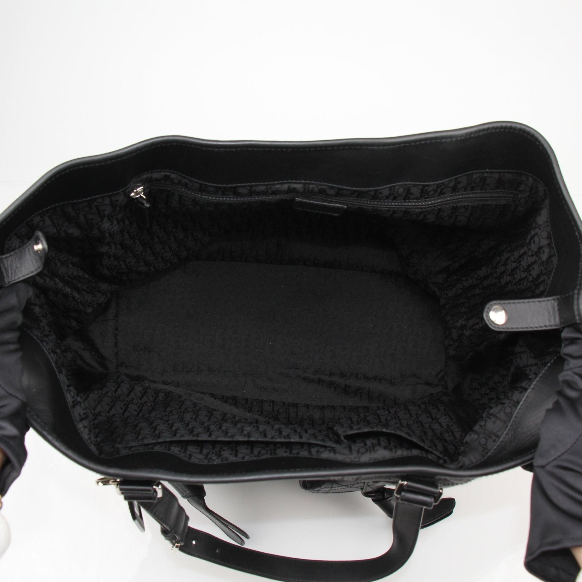 Christian Dior Rasta Cannage Tote travel bag with colorful rasta pattern and gold-tone hardware, crafted with luxurious leather.