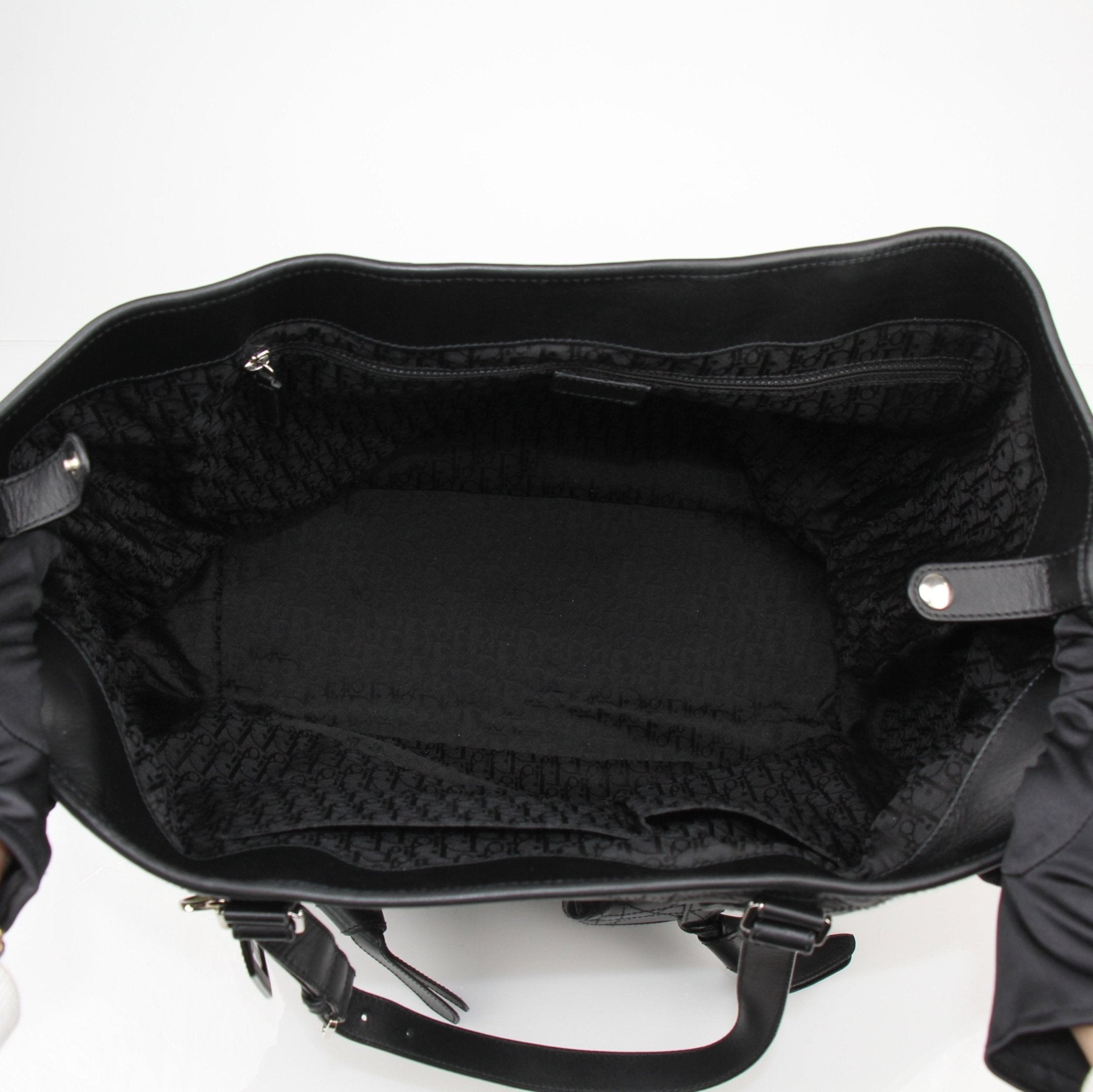 Christian Dior Rasta Cannage Tote travel bag with colorful rasta pattern and gold-tone hardware, crafted with luxurious leather.
