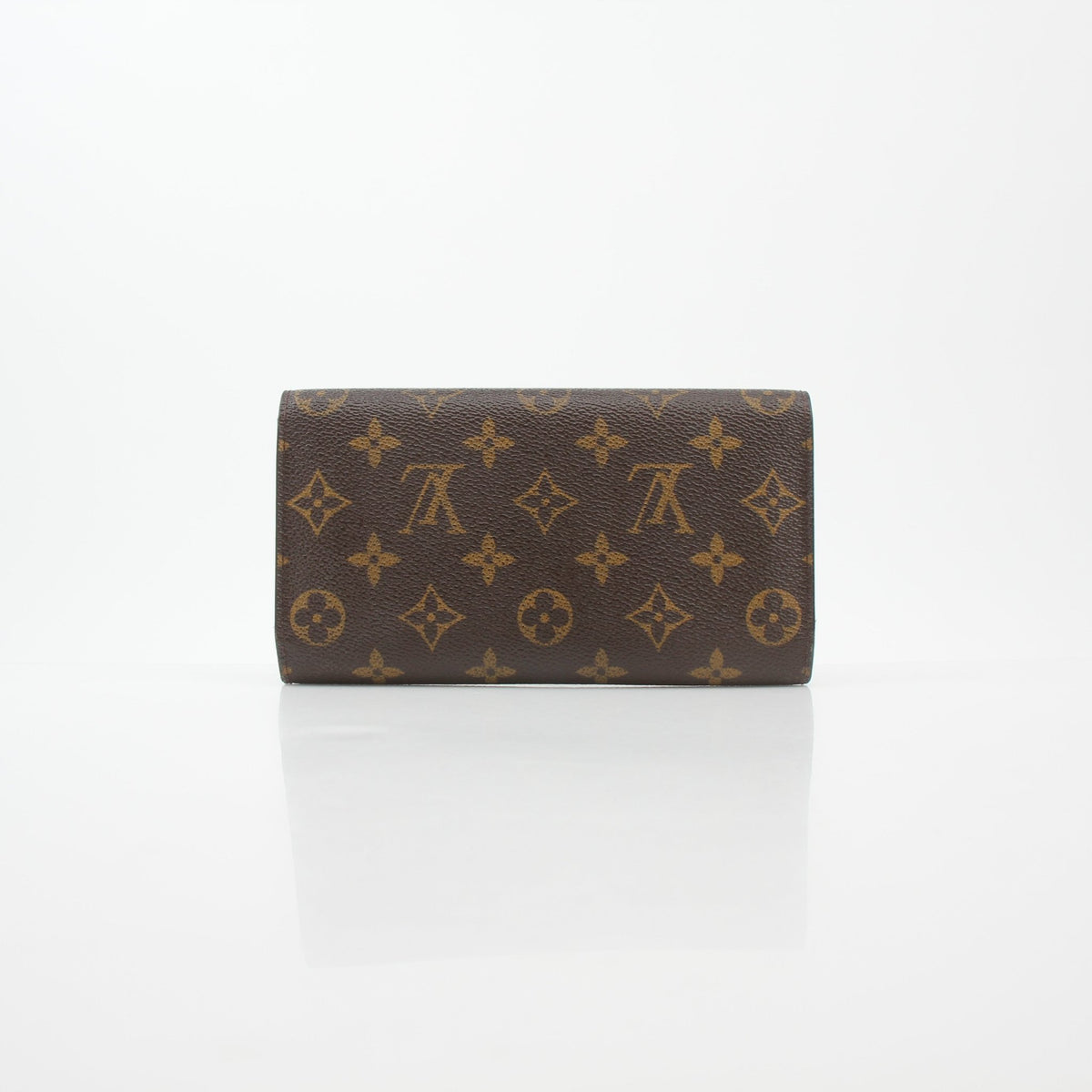 Louis Vuitton brown monogram portefeuille international wallet with multiple card slots and compact design.