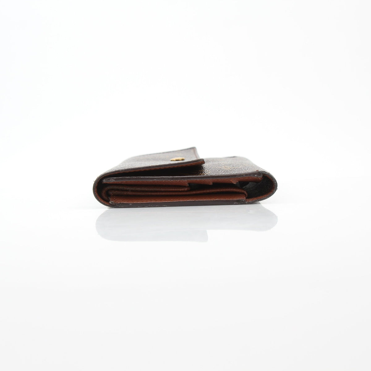 Louis Vuitton brown monogram portefeuille international wallet with multiple card slots and a sleek design, displayed on a neutral background.