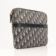 Christian Dior Oblique canvas pouch, a stylish handbag with signature pattern, featuring a sleek design and gold-tone accents.