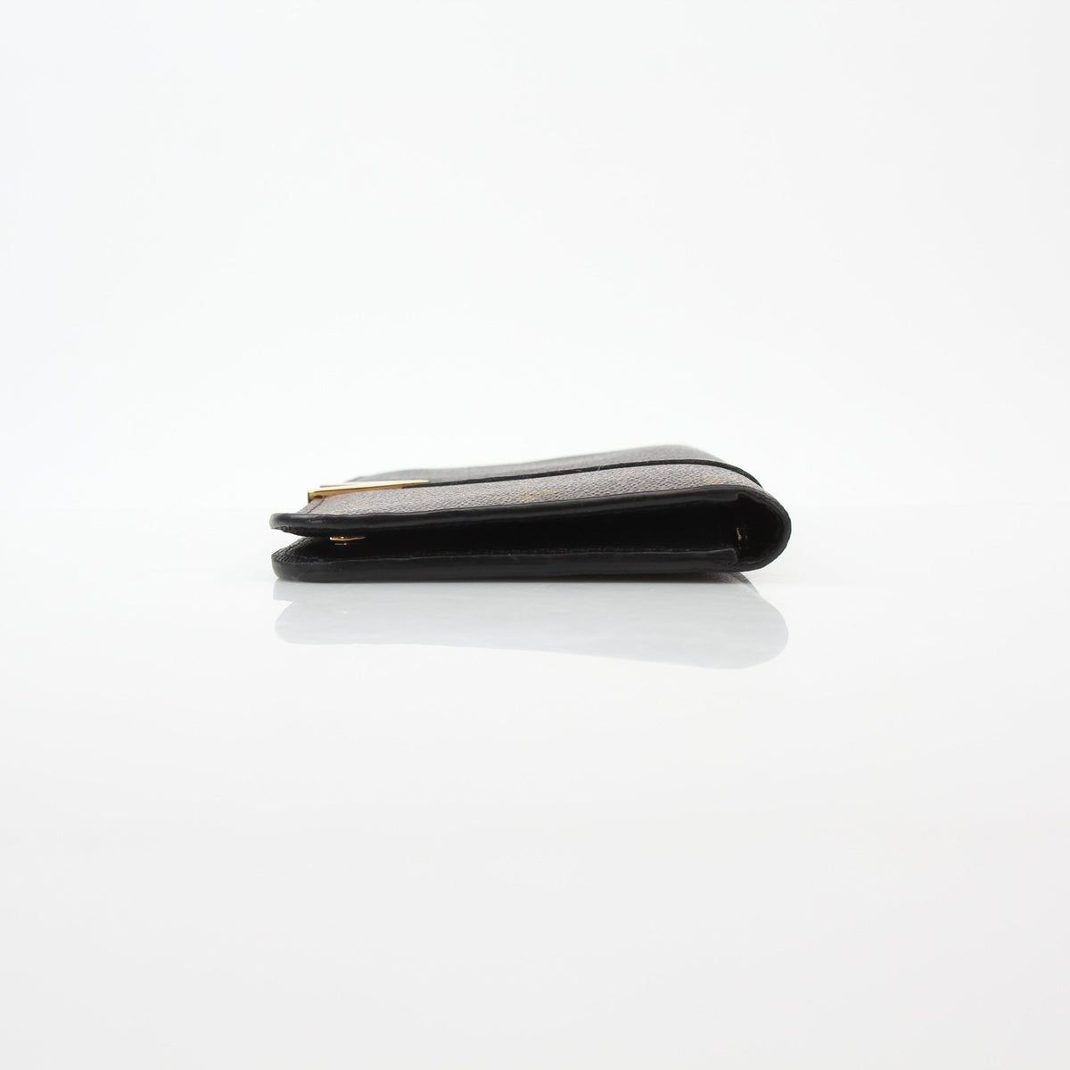 Louis Vuitton black monogram kimono wallet with gold accents, featuring signature monogram pattern and compact design.