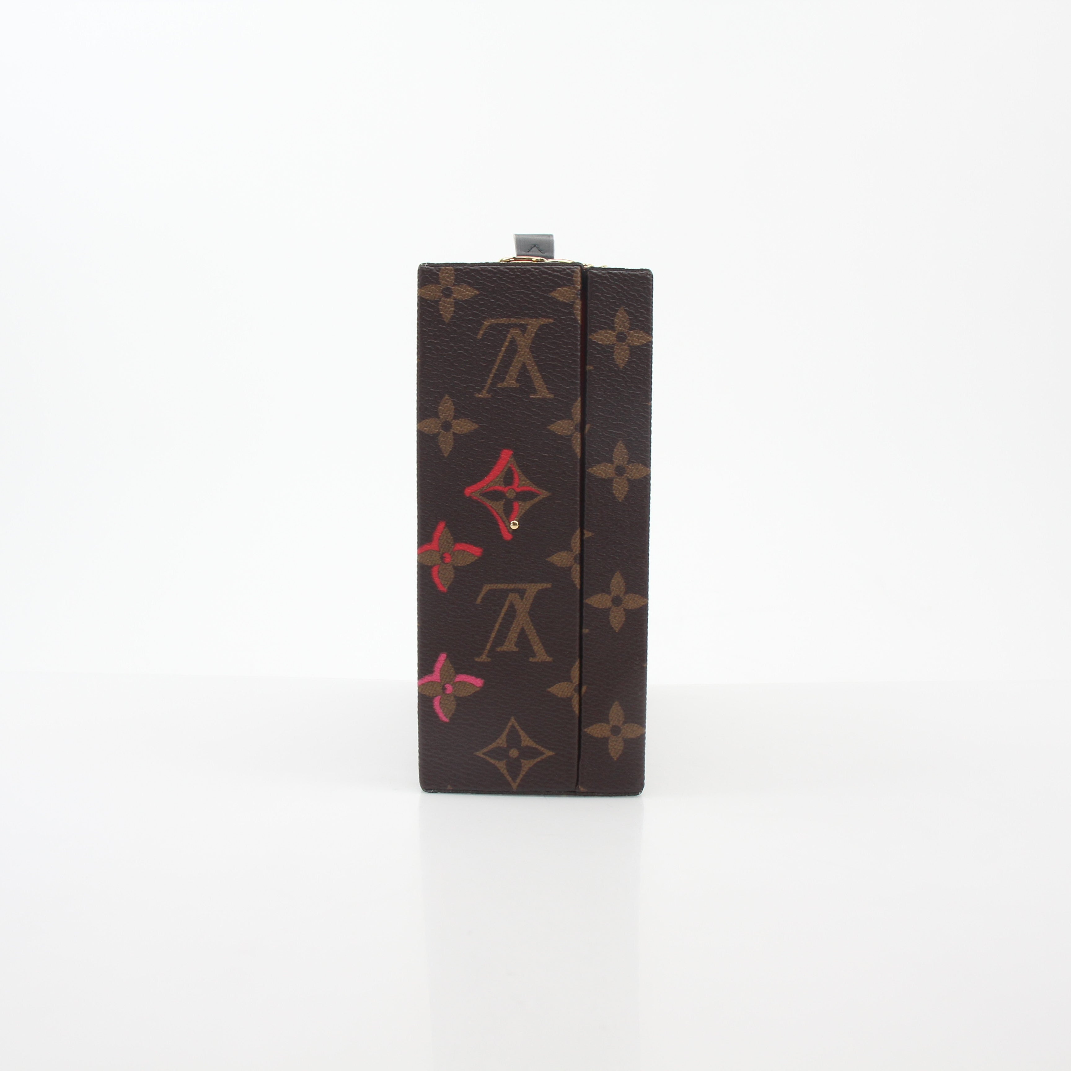 Louis Vuitton Fall in Love Mobile Box Trunk Bag handbag with gold accents and structured design, displayed on a neutral background.