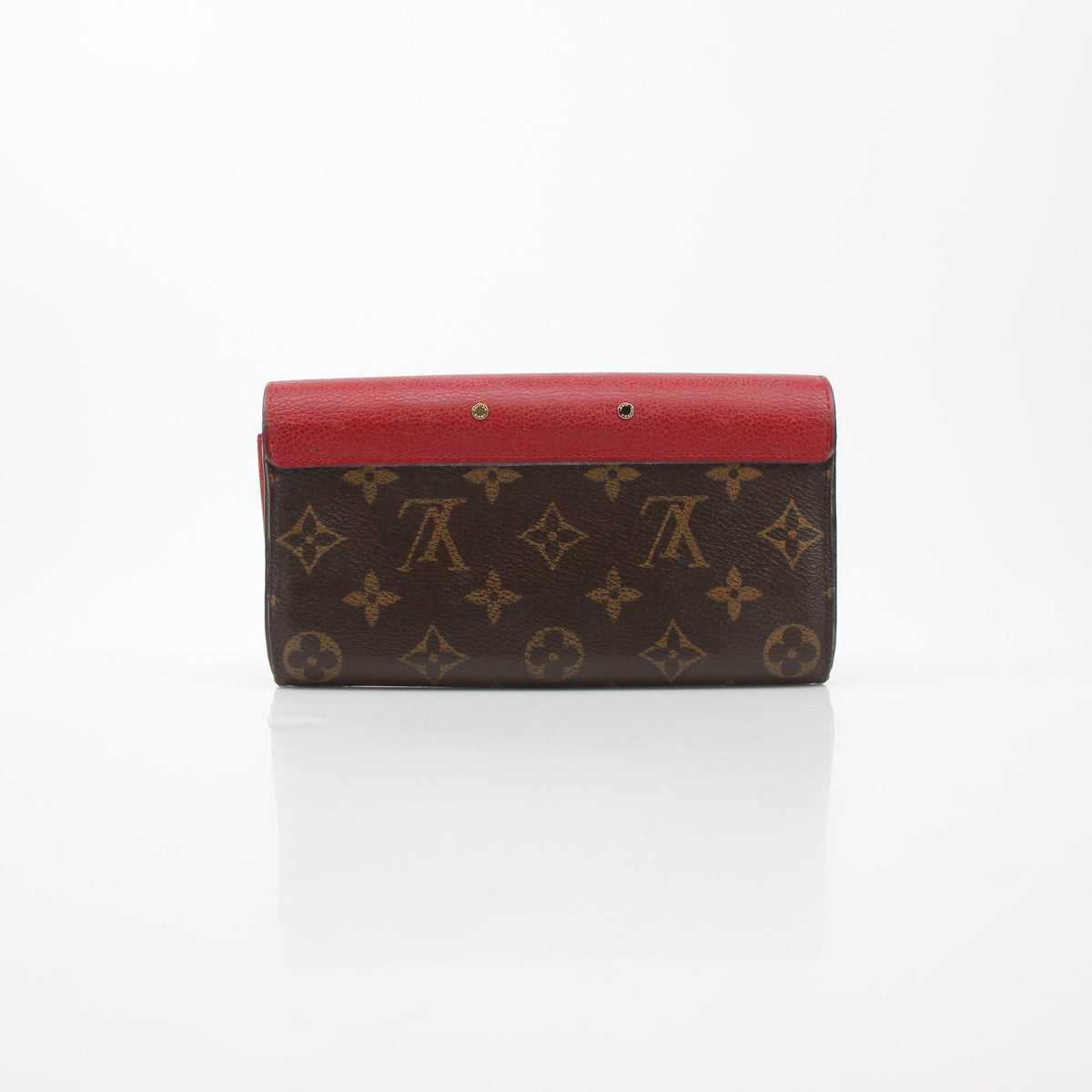 Louis Vuitton brown monogram Pallas wallet with red accents, featuring gold hardware and multiple card slots.