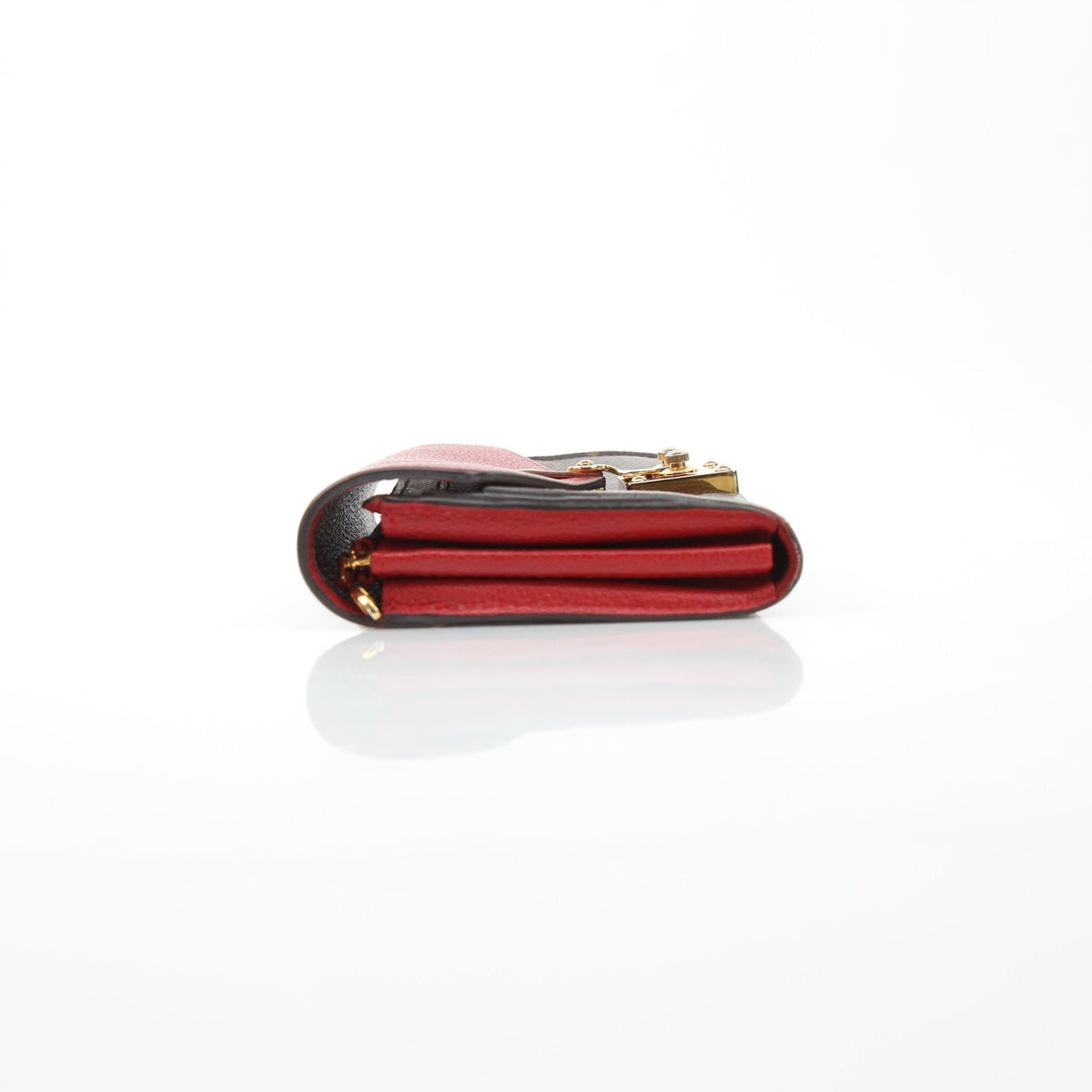 Brown Louis Vuitton Monogram Pallas Wallet with red accents, featuring gold-tone hardware and multiple card slots.