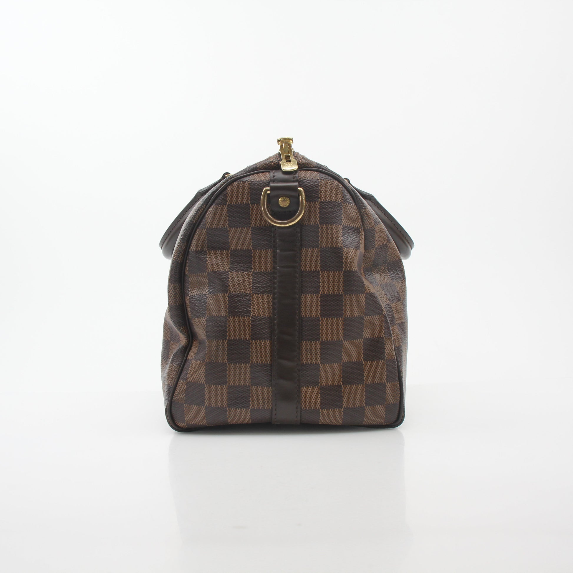 Louis Vuitton Damier Ebene Speedy Bandoulière 30 handbag with leather handles and gold-tone hardware, displayed on a neutral background.
